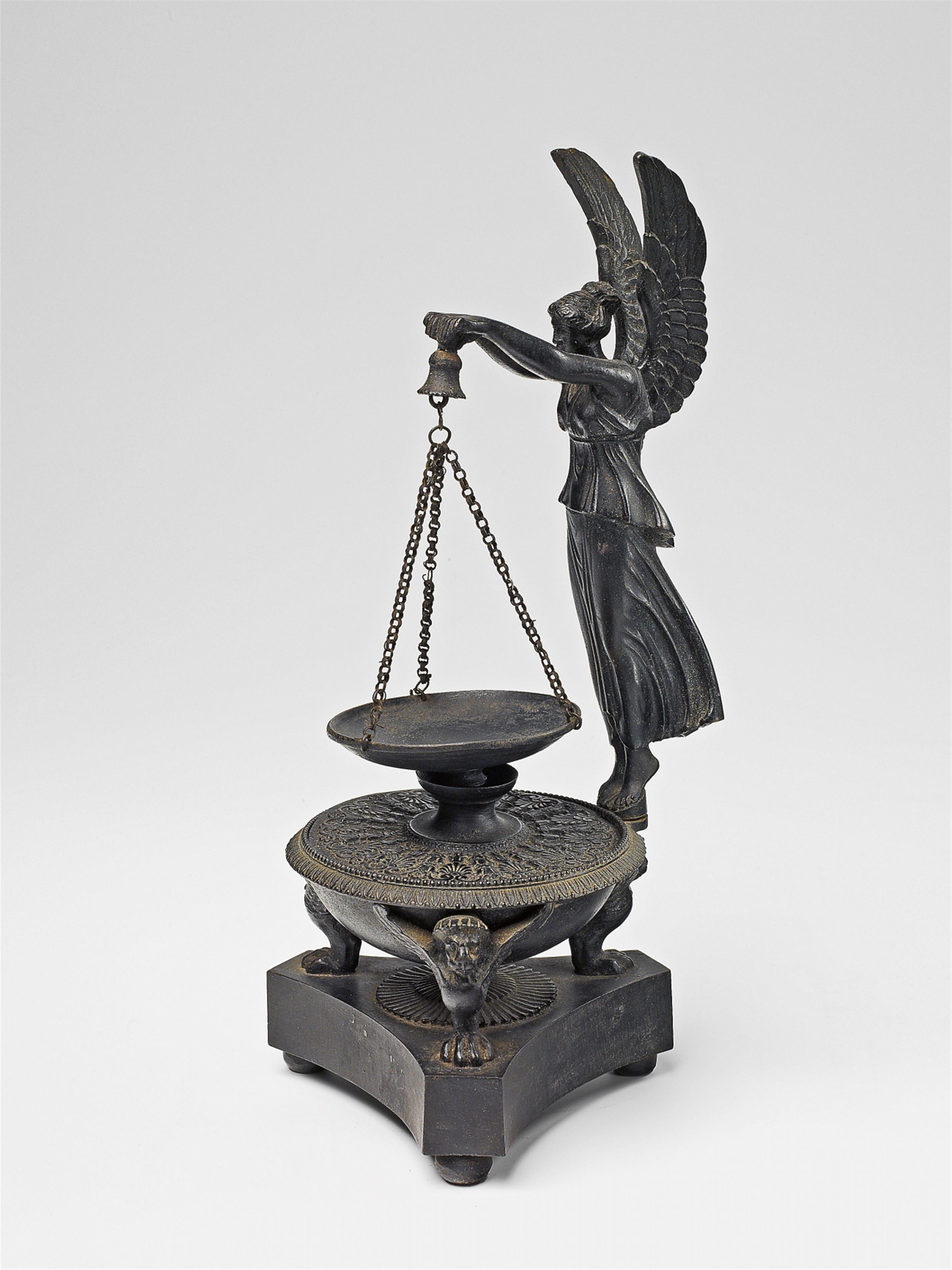 A Berlin cast iron incense burner with a figure of Victory - image-1