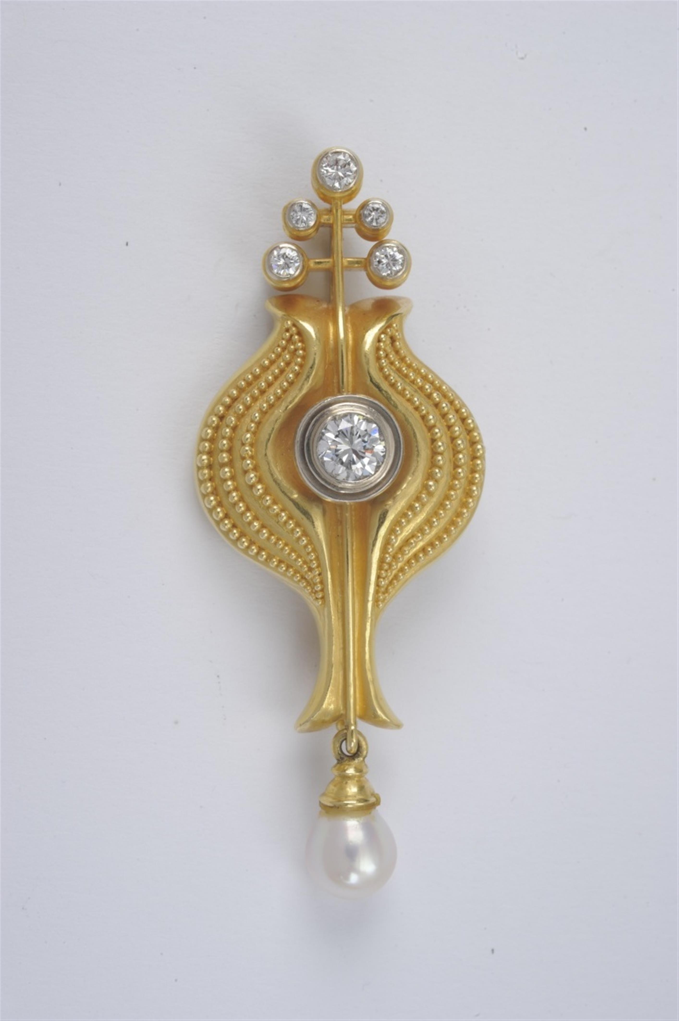 An 18k gold and diamond pendant brooch made by Wilhelm Nagel - image-1