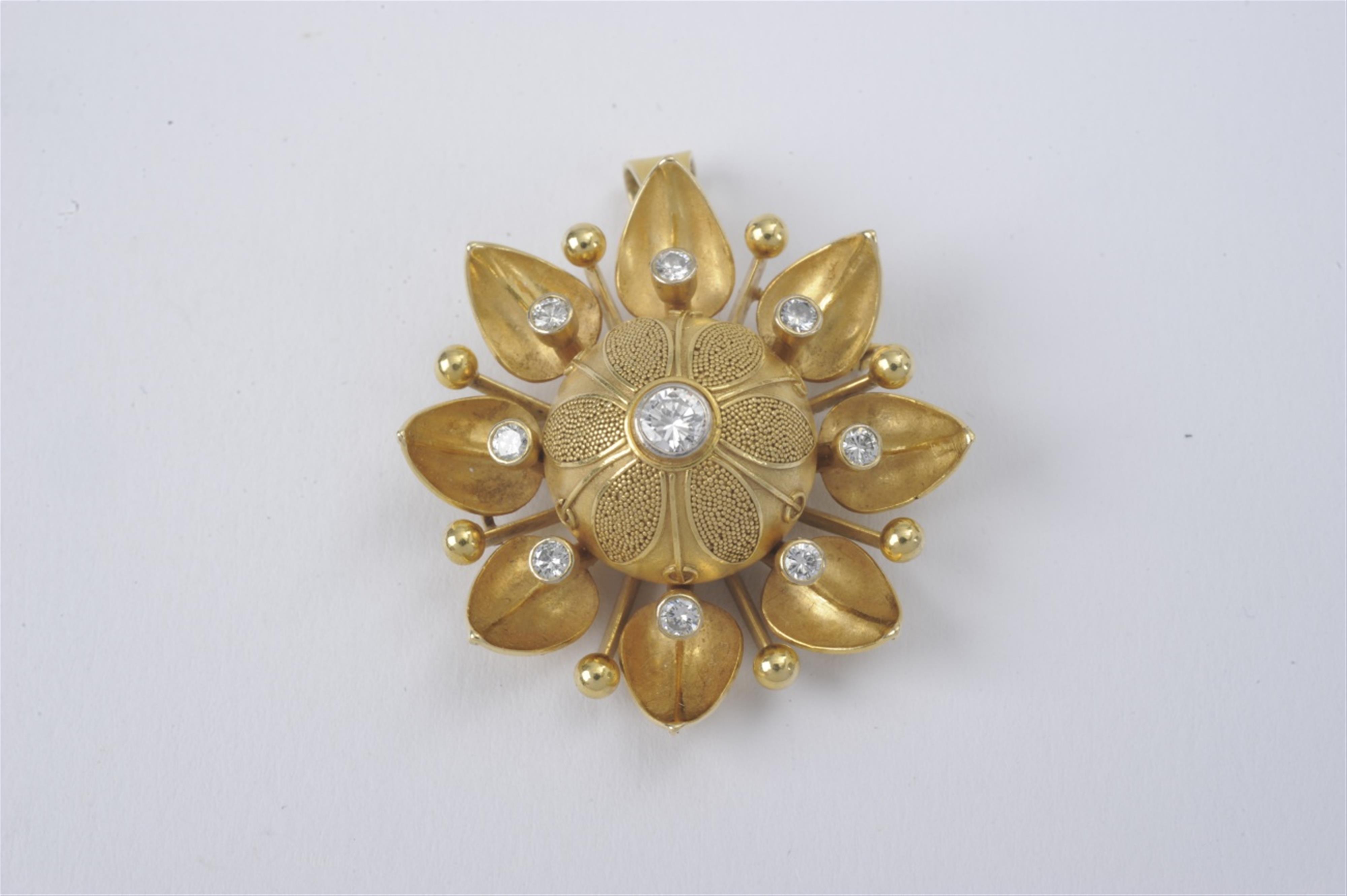 An 18k gold and diamond pendant - image-1