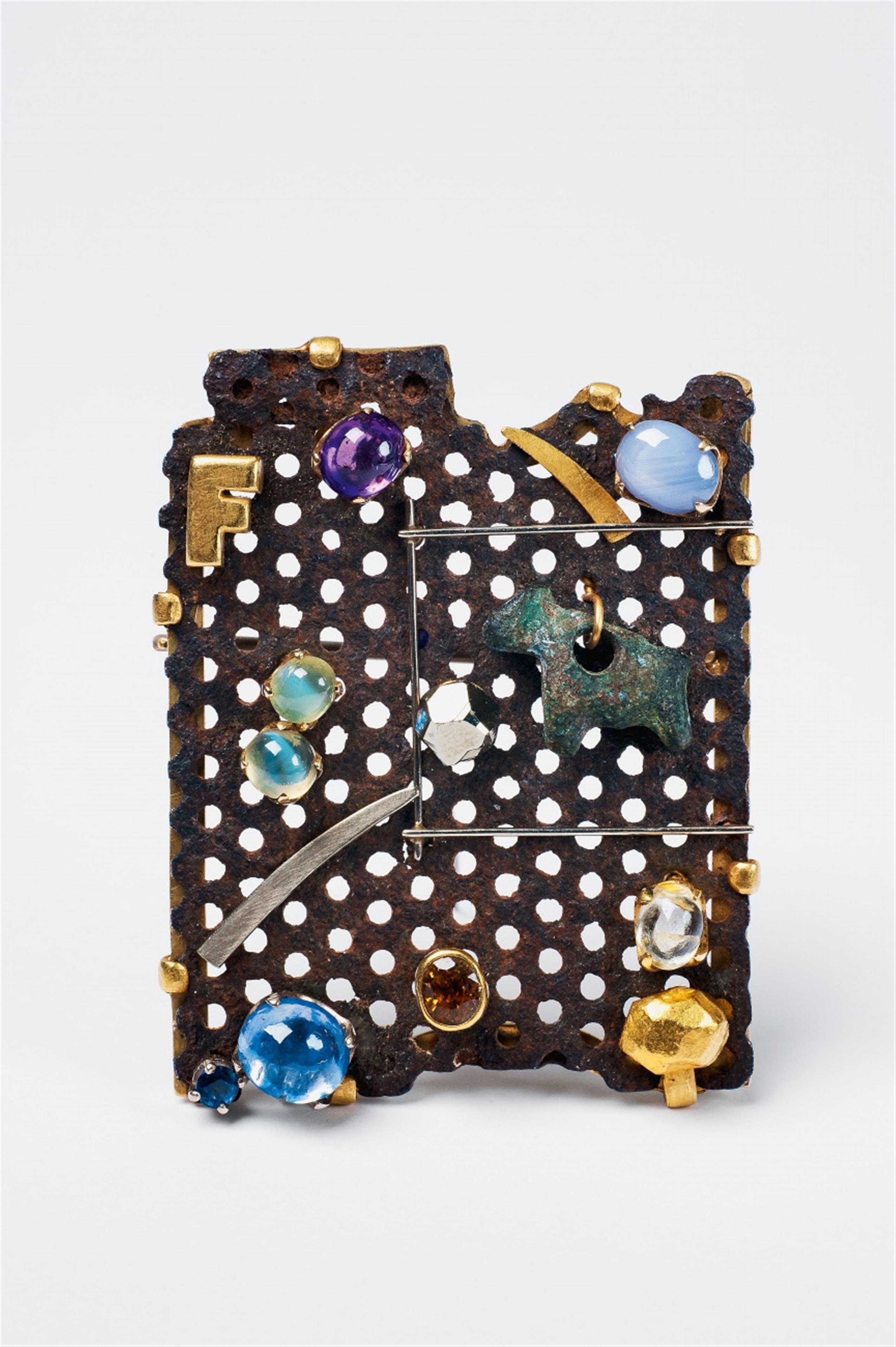 An iron, platinum, 18k gold brooch set with "objets trouvés" and various gems by Falko Marx, Cologne - image-1