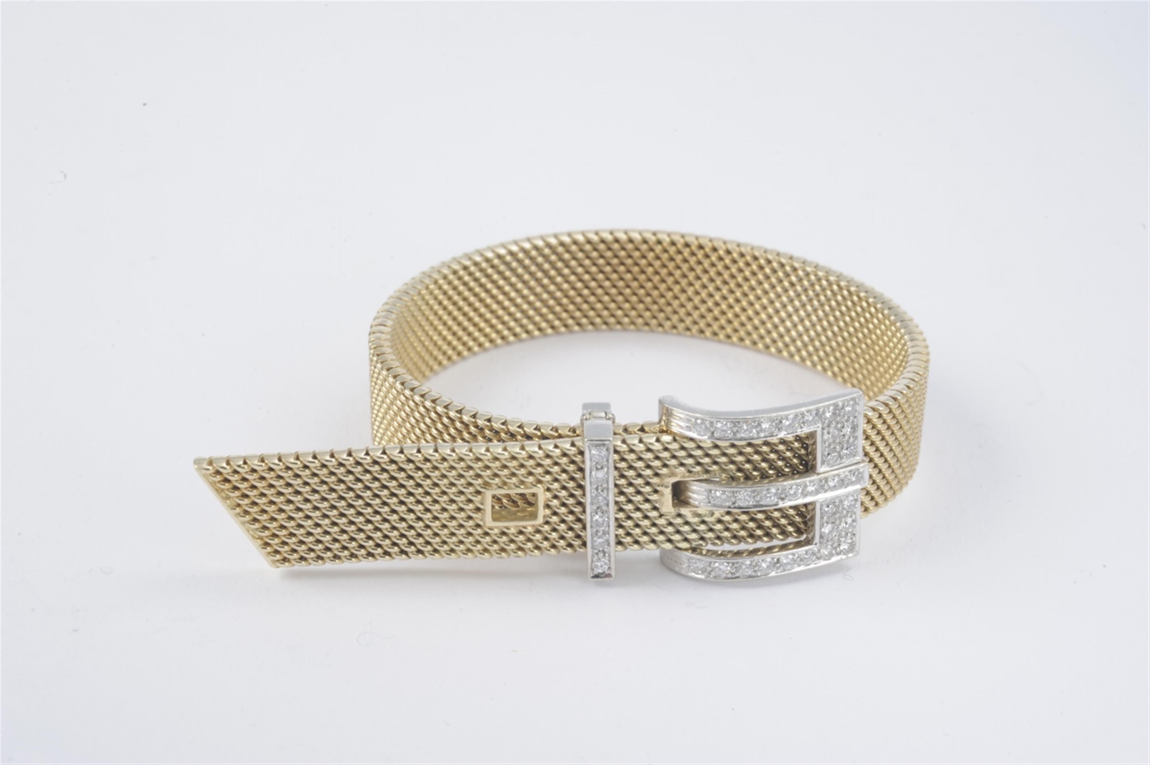 A 14k gold bracelet formed as a belt - image-1