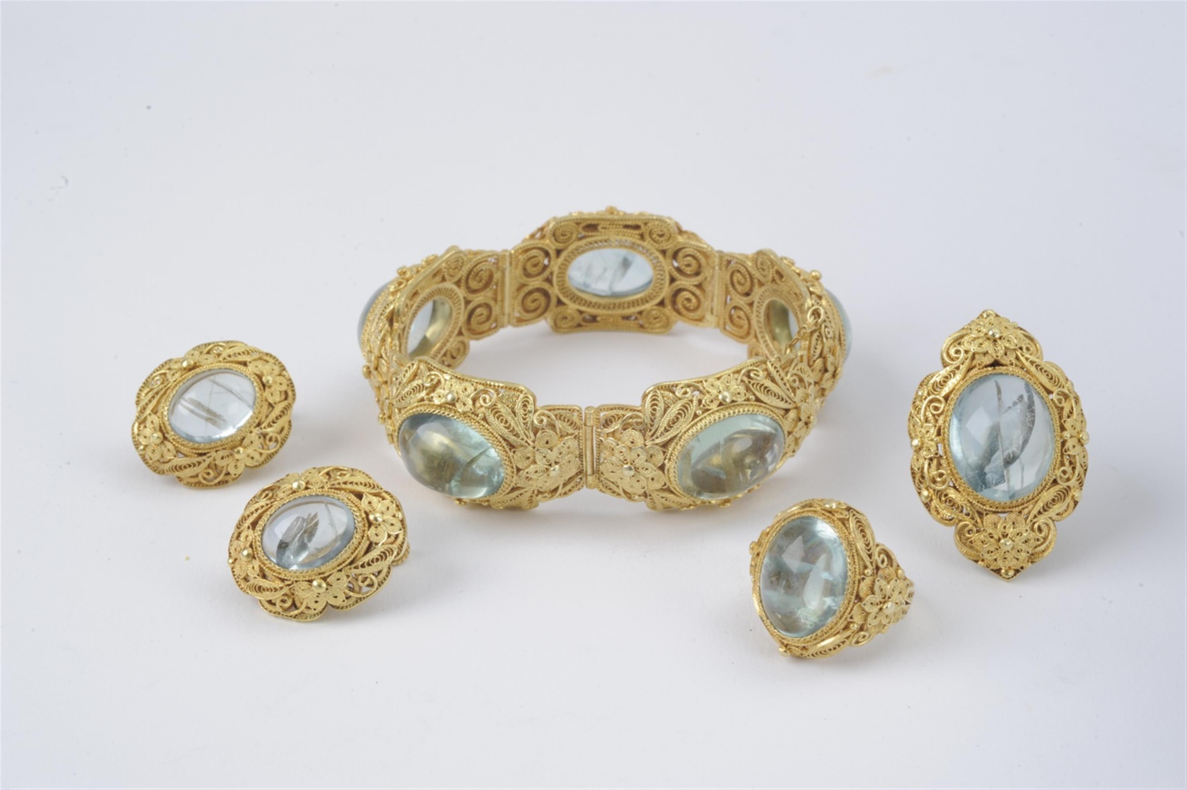 A Chinese silver gilt and fluorite garniture - image-1