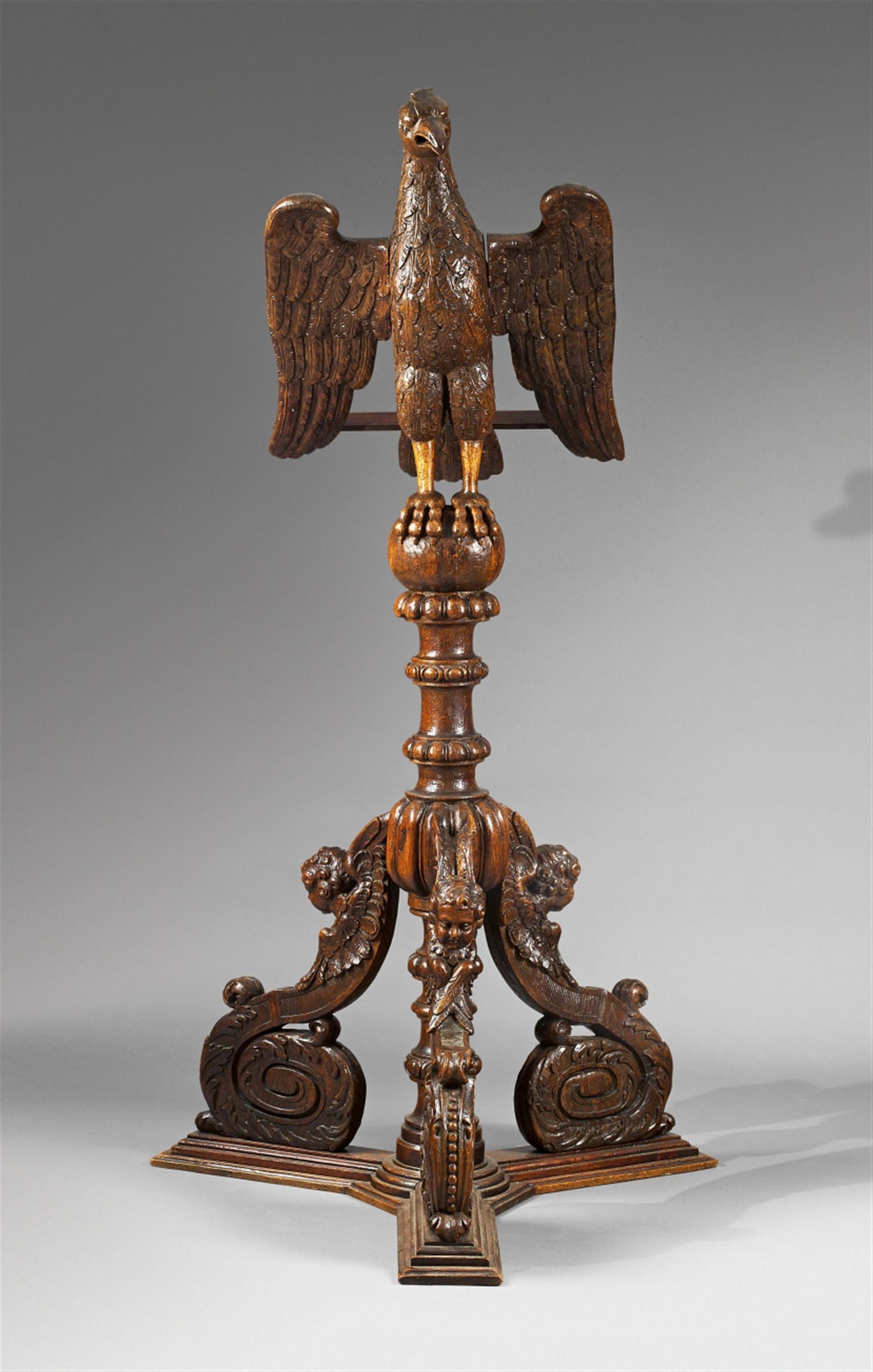 A rare large carved oak eagle lectern - image-2