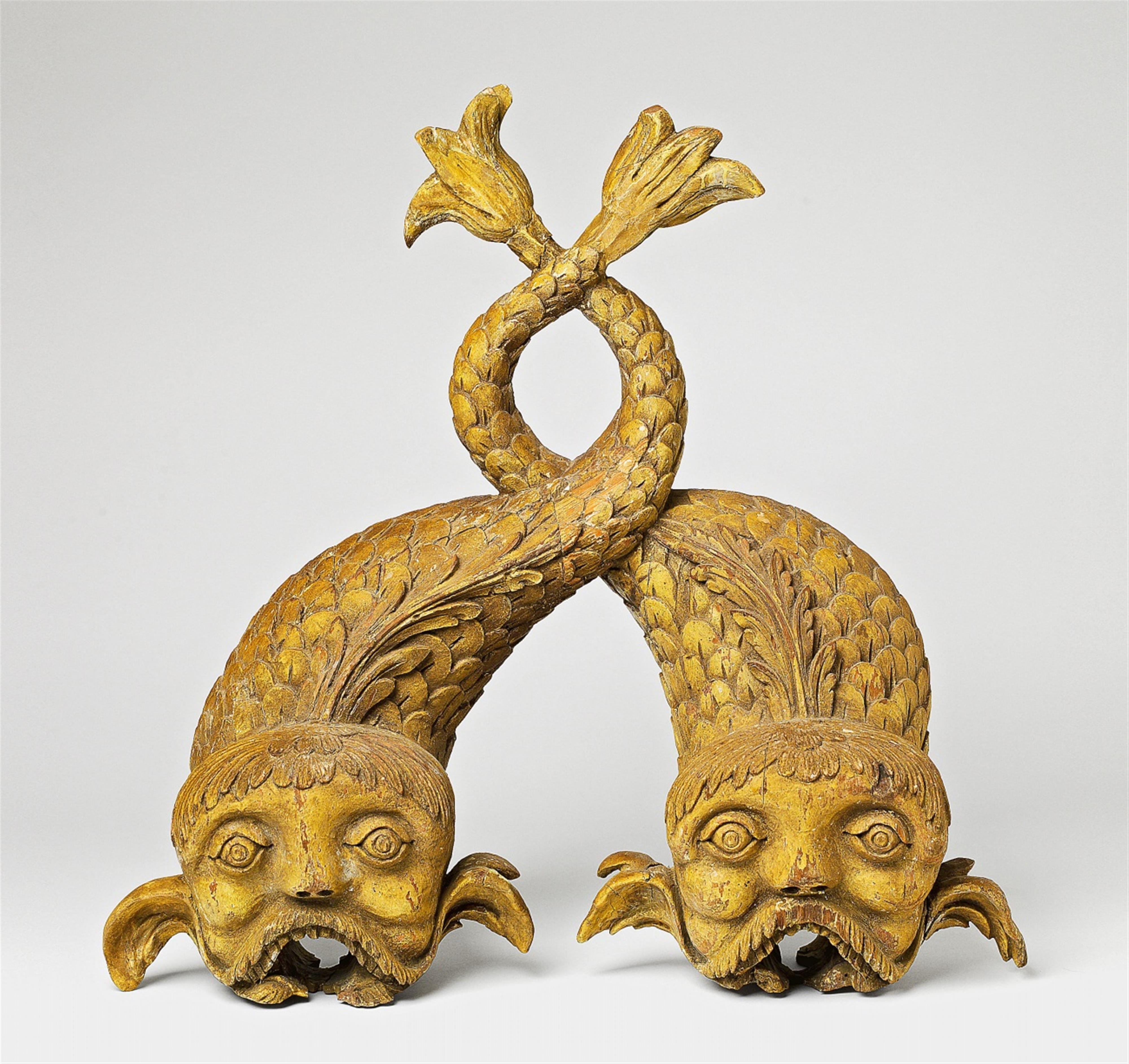 A South German carved walnut model of two dolphins - image-1
