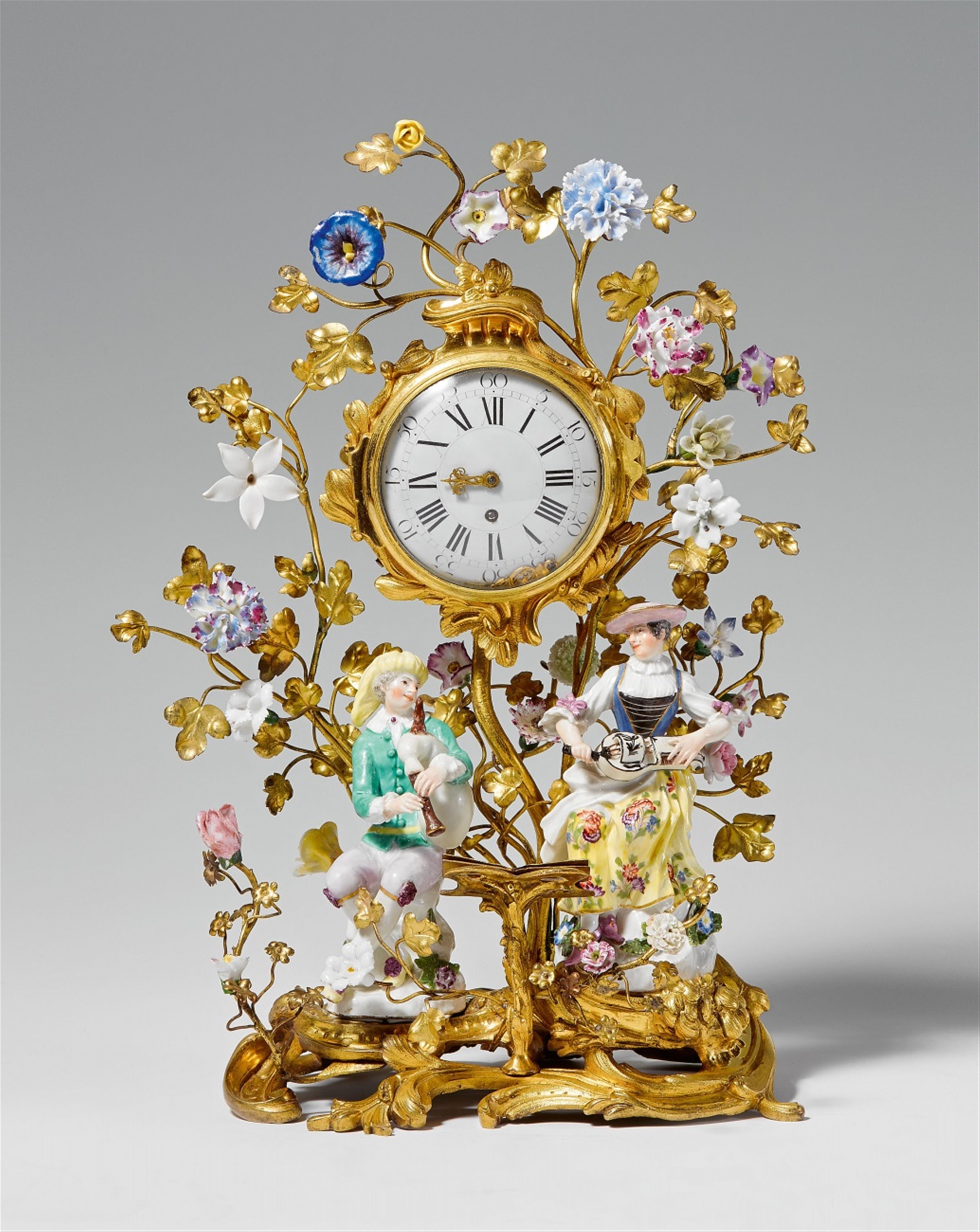 An ormolu clock with two Meissen porcelain musician figures - image-1