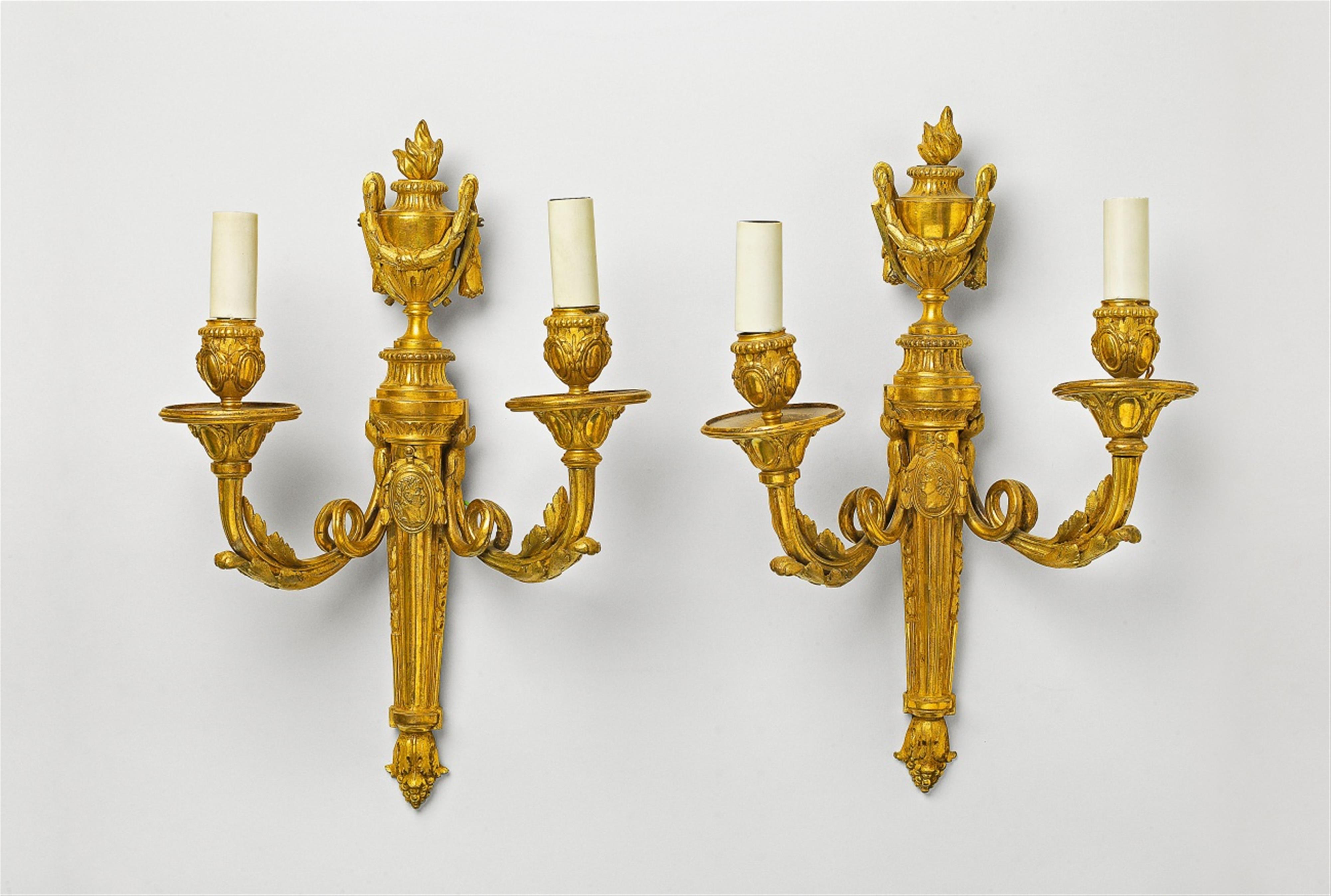 A pair of Louis XVI ormolu wall appliques - image-1