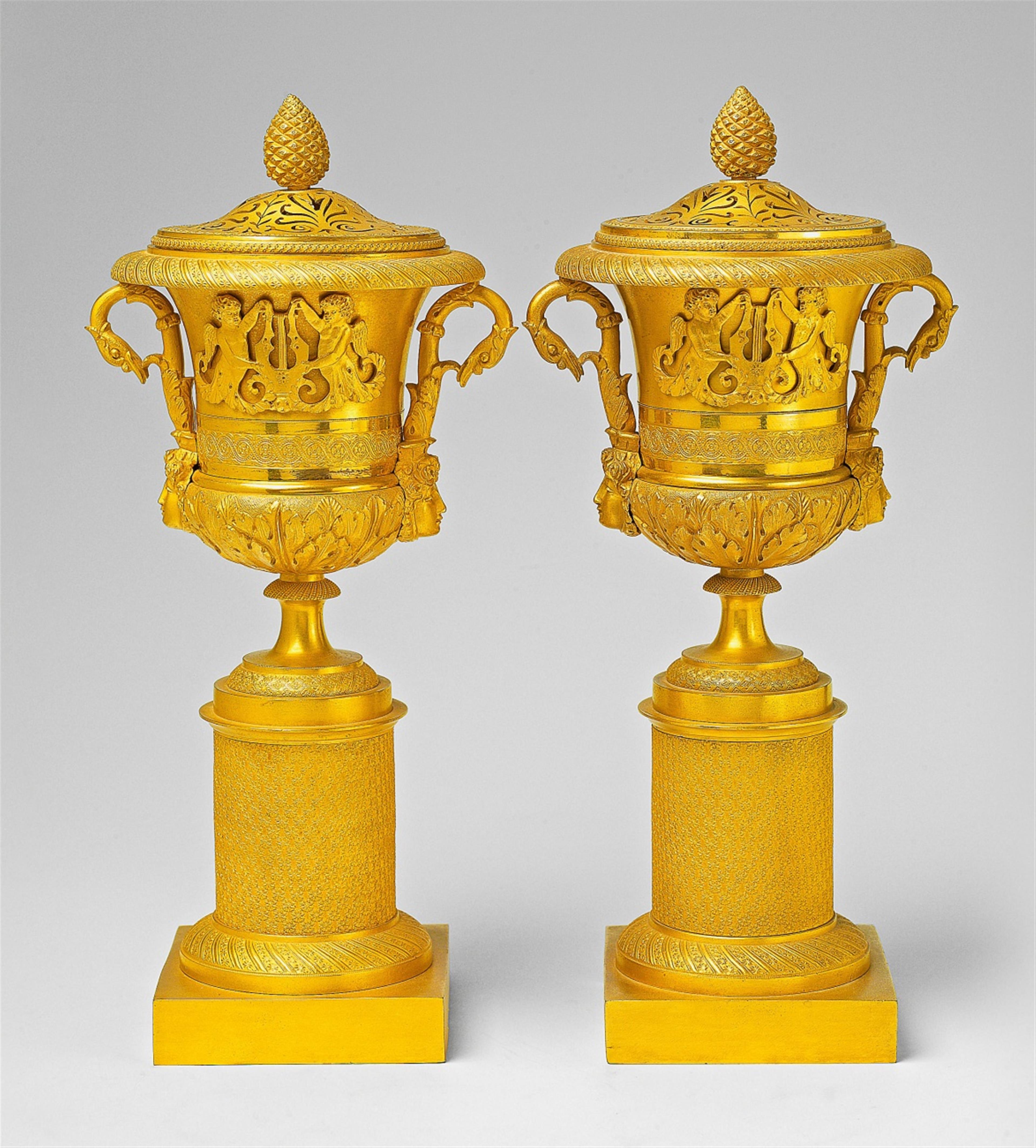 A pair of large époque Empire ormolu cassolettes - image-1