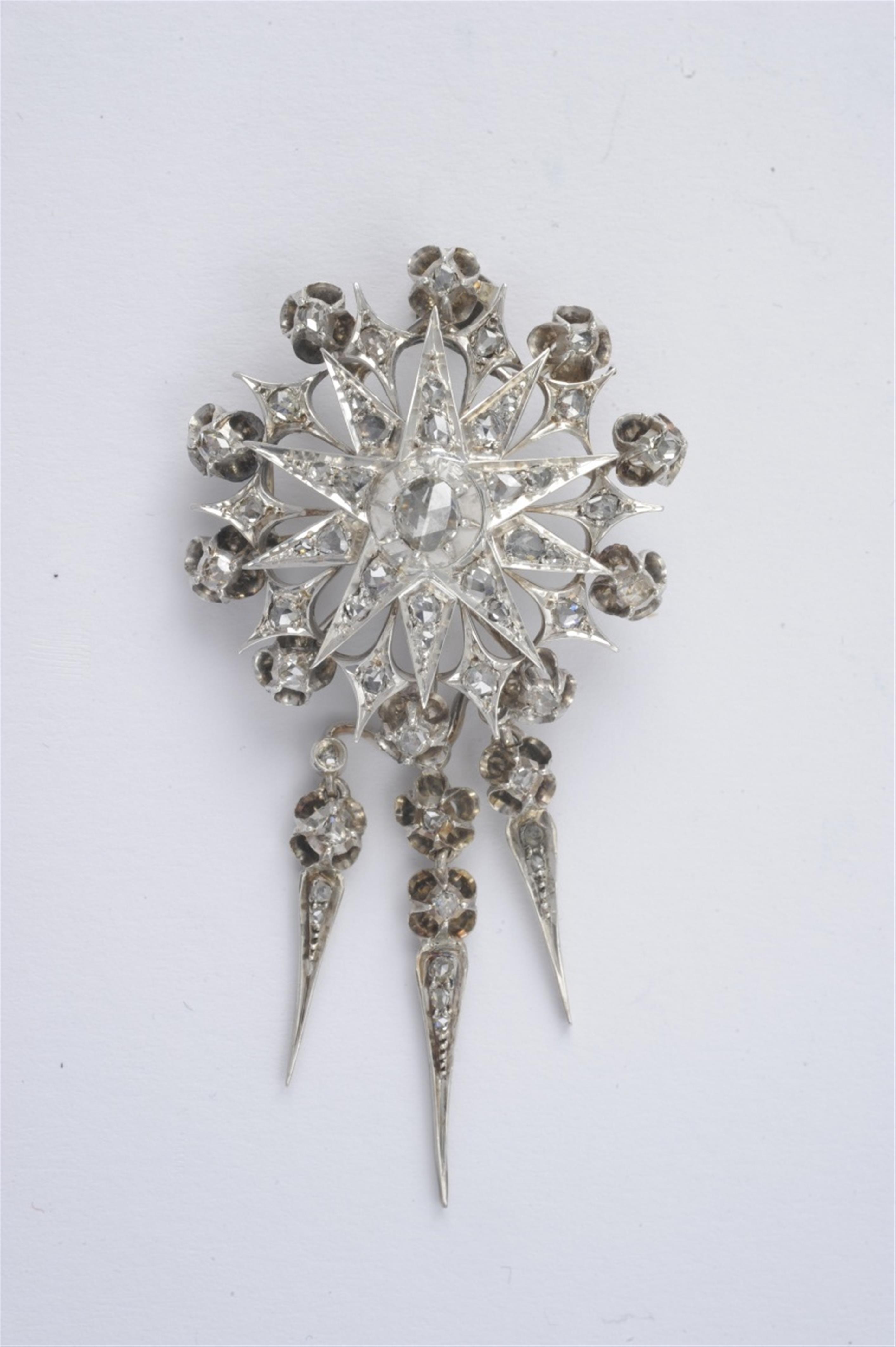 A 14k white gold and diamond pendant brooch - image-1