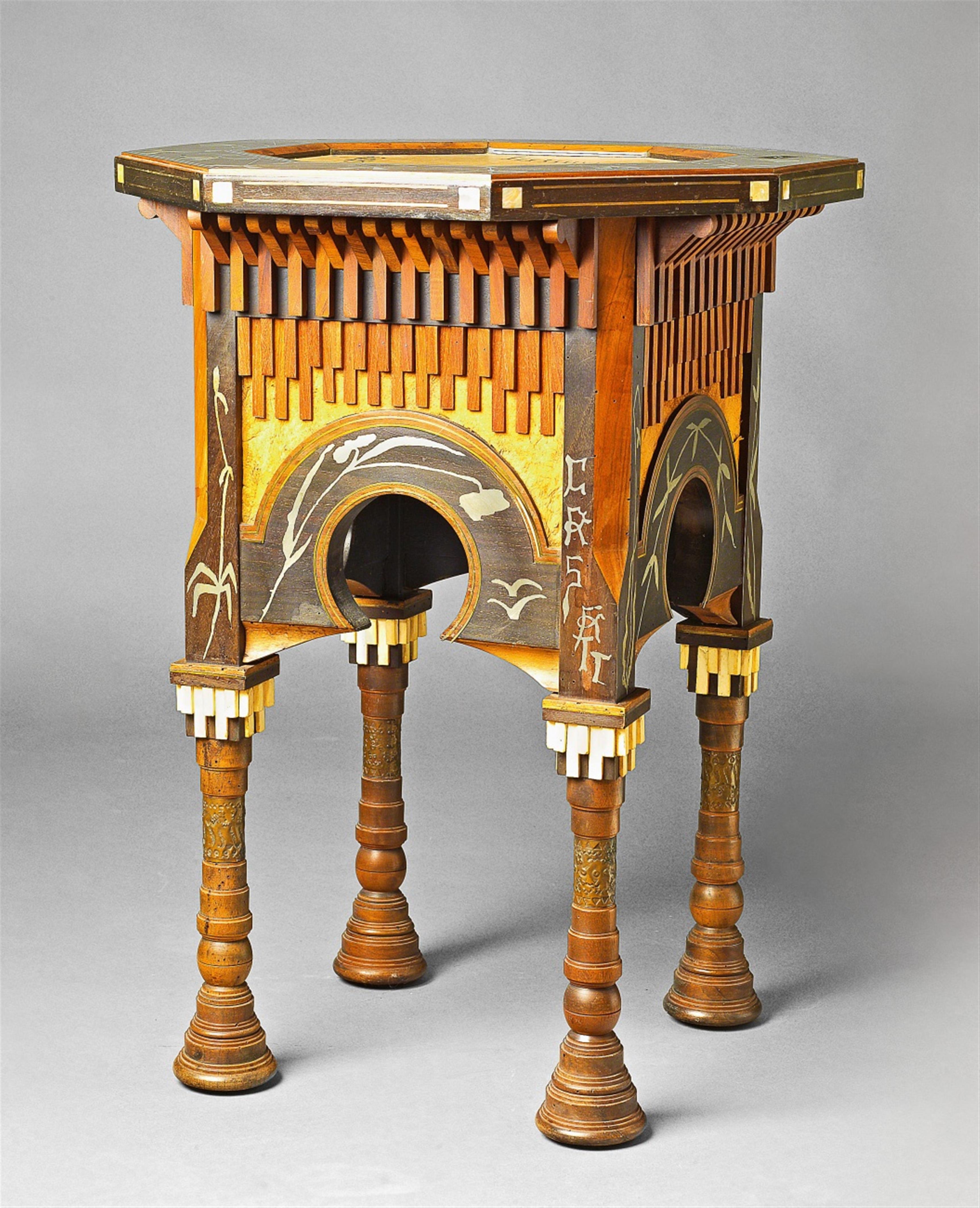 An inlaid side table by Carlo Bugatti - image-1