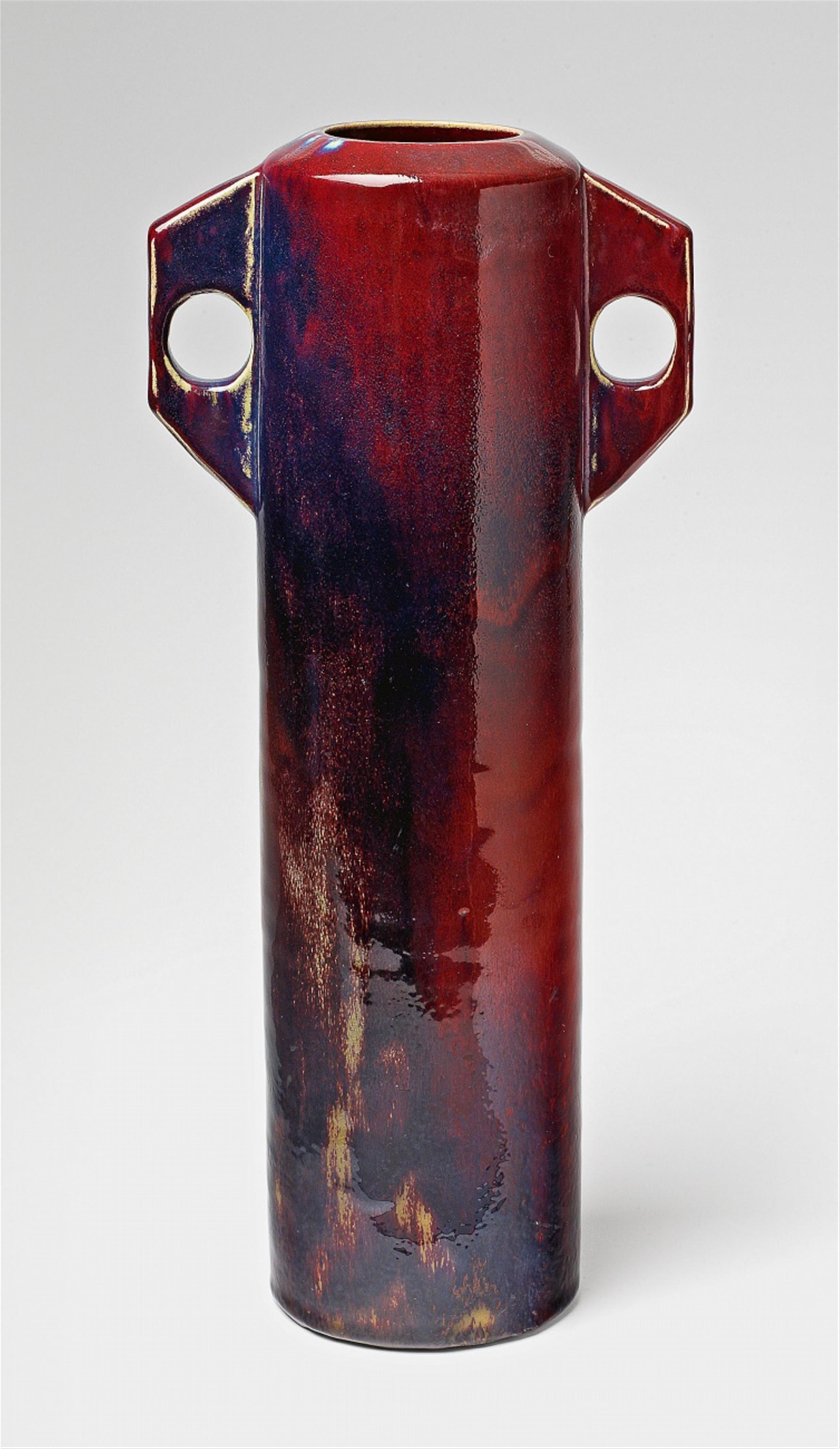 A narrow copper-red feldspar glazed stoneware vase - image-1
