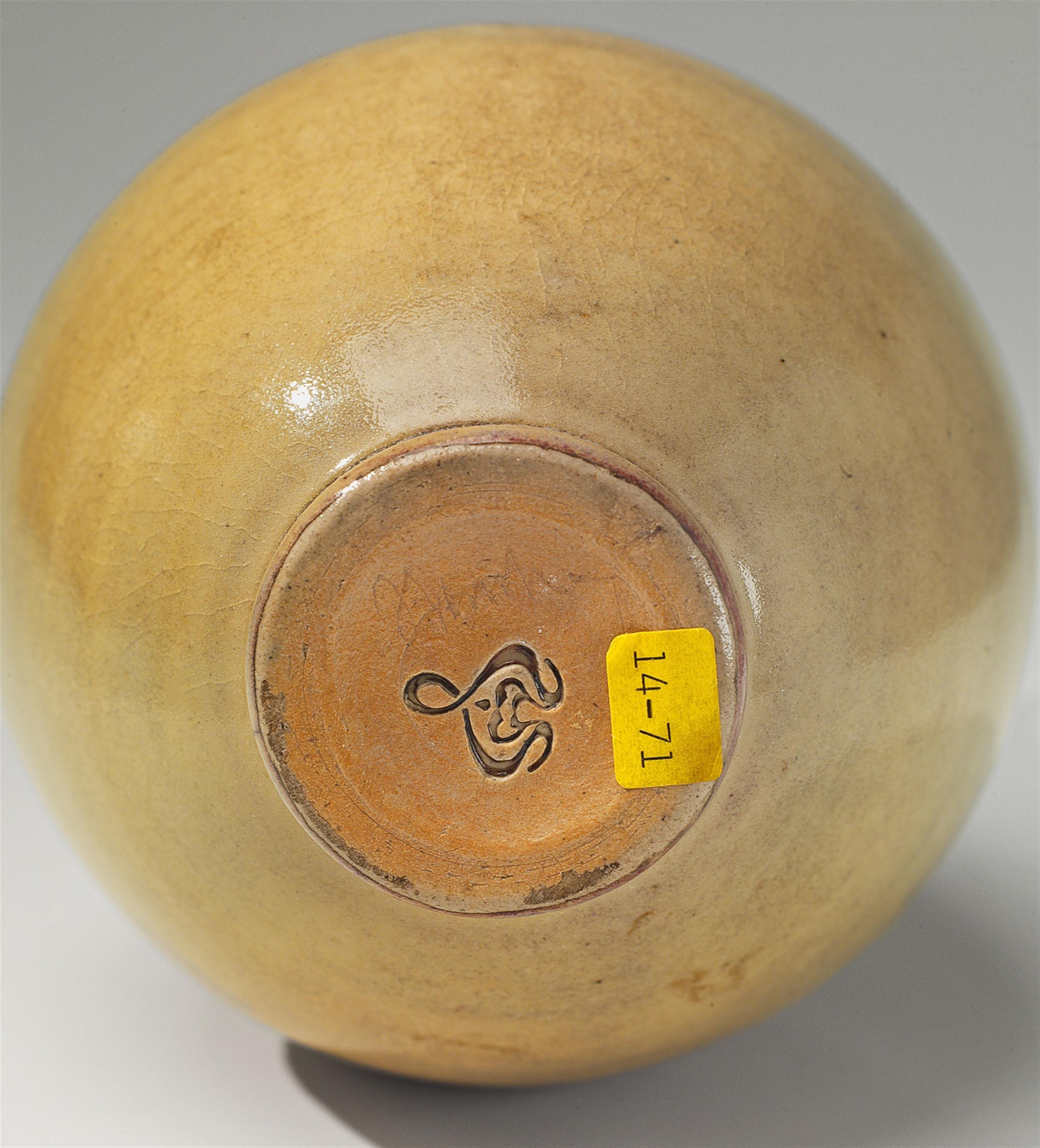A small beige feldspar glazed stoneware vase - image-2