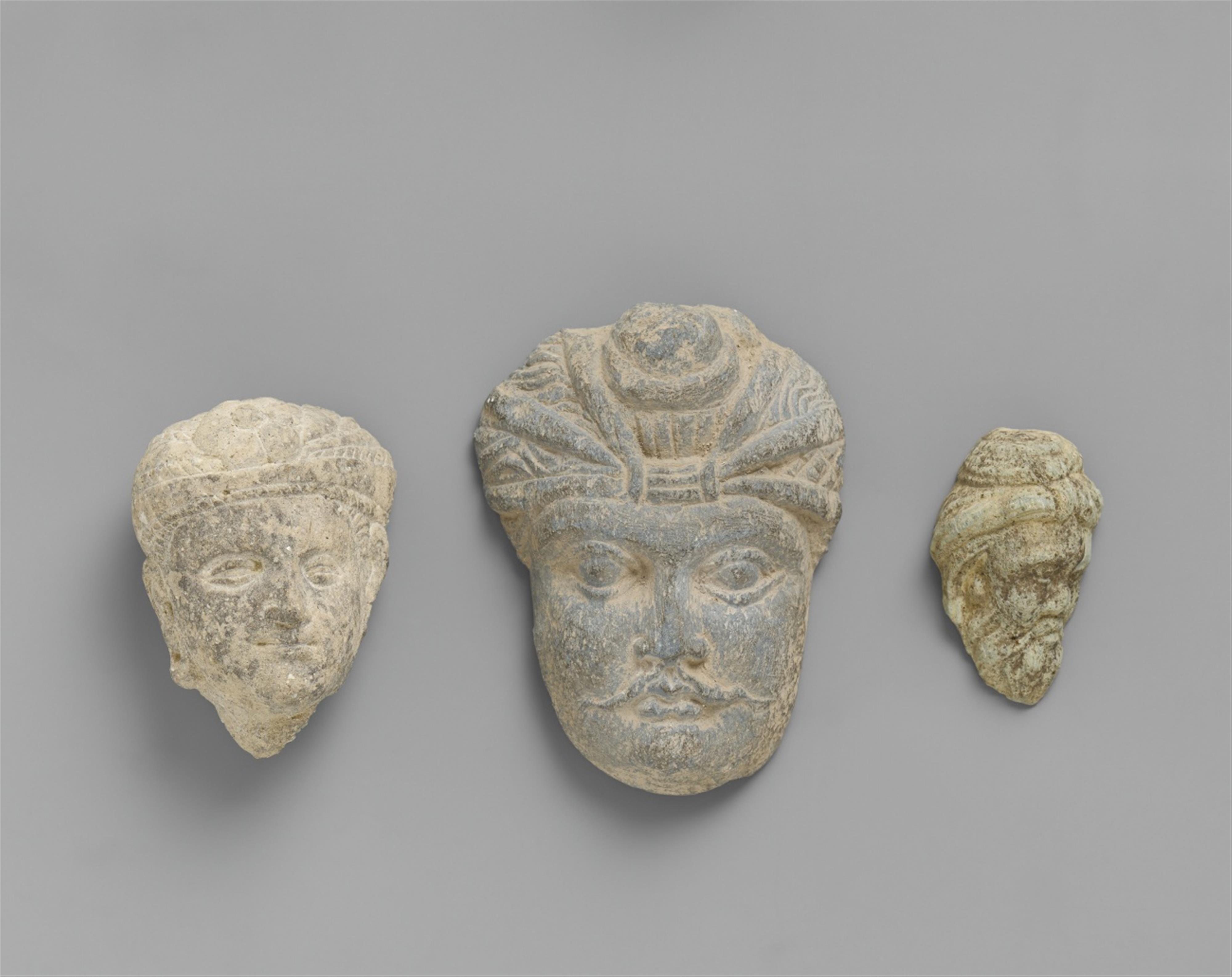 Three Gandhara stone heads. 2nd/3rd century - image-1