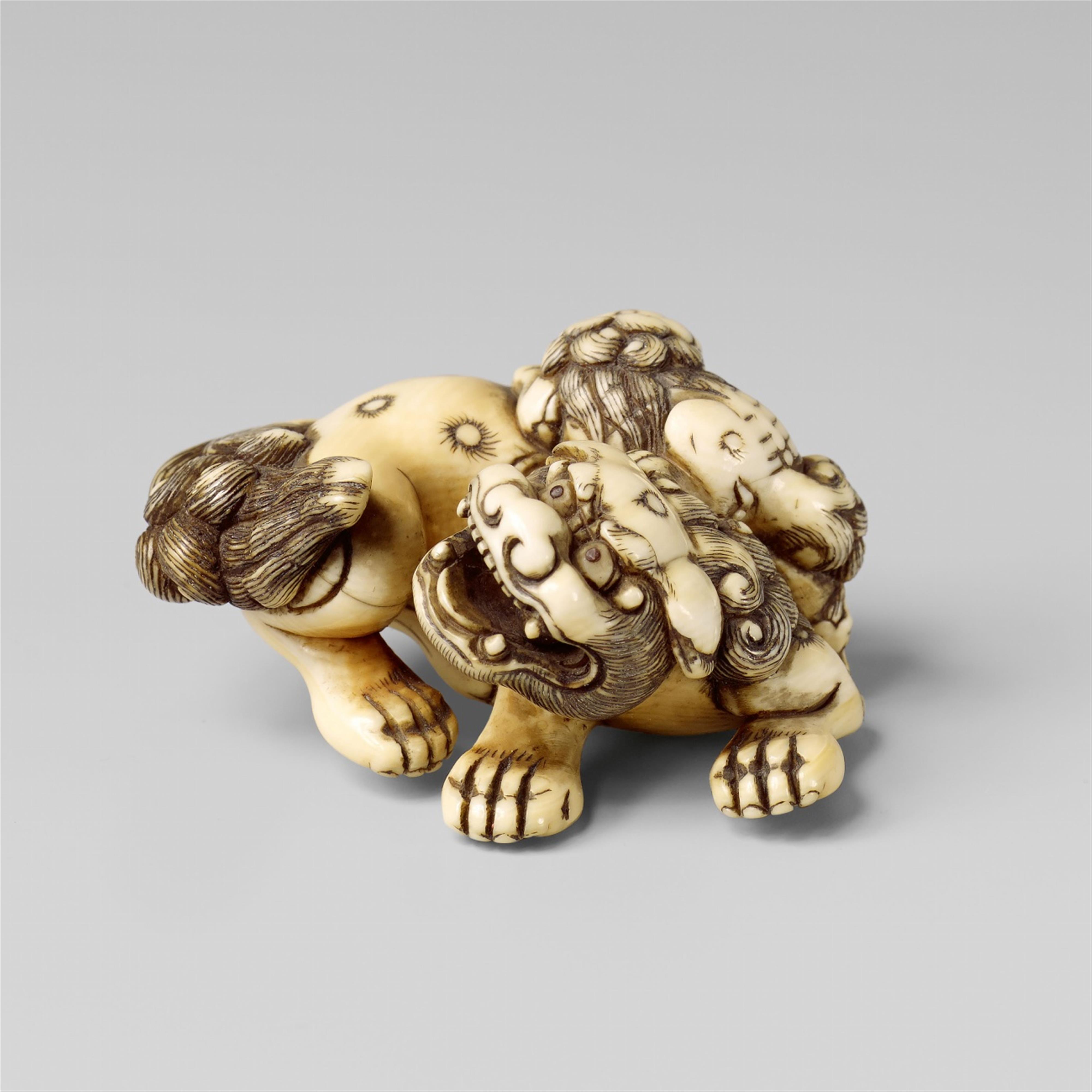 A fine Kyoto school ivory netsuke of a shishi and young. Late 18th century - image-1