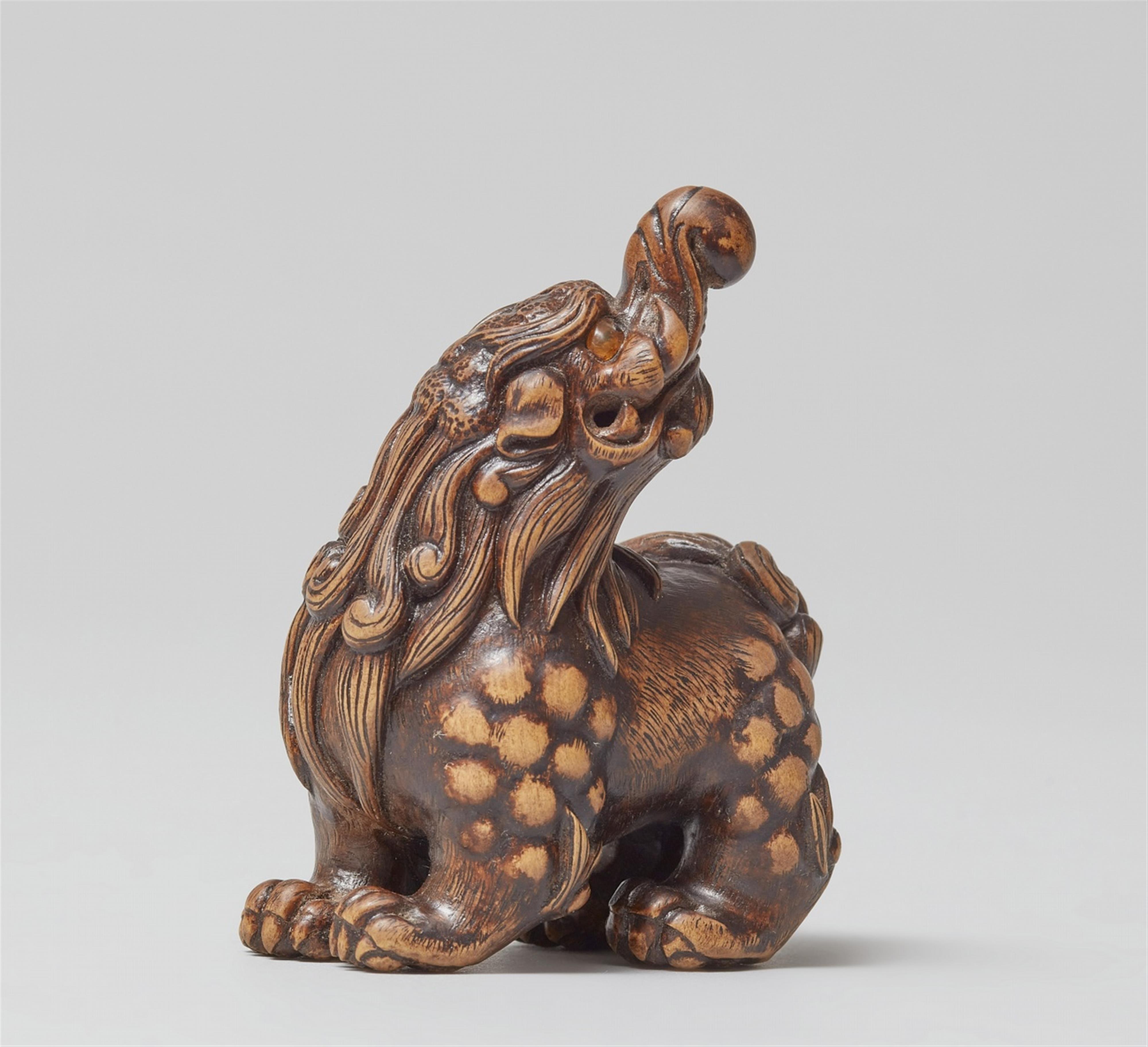 A wood netsuke of a baku. Early 21th century - image-1