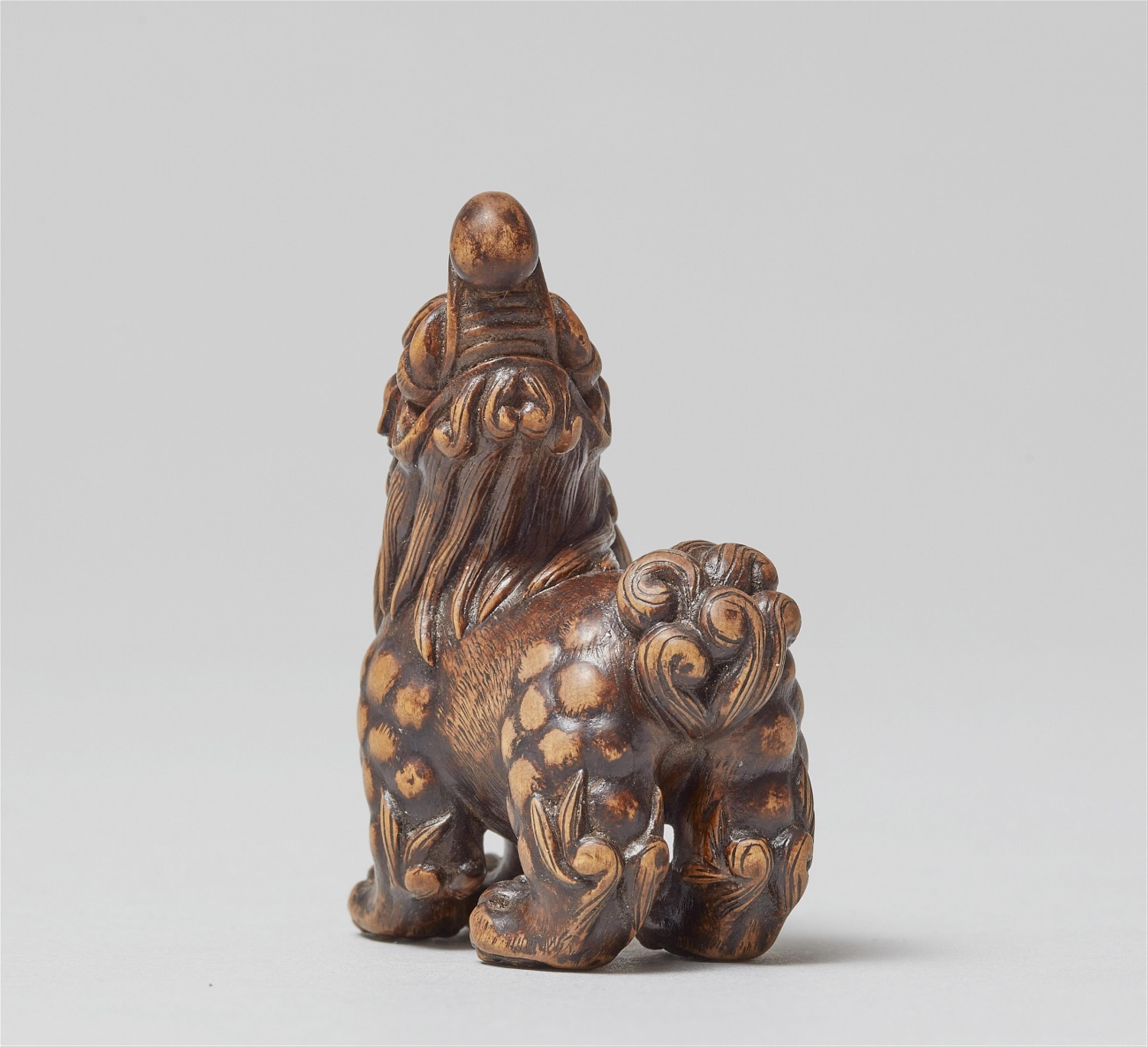 A wood netsuke of a baku. Early 21th century - image-4