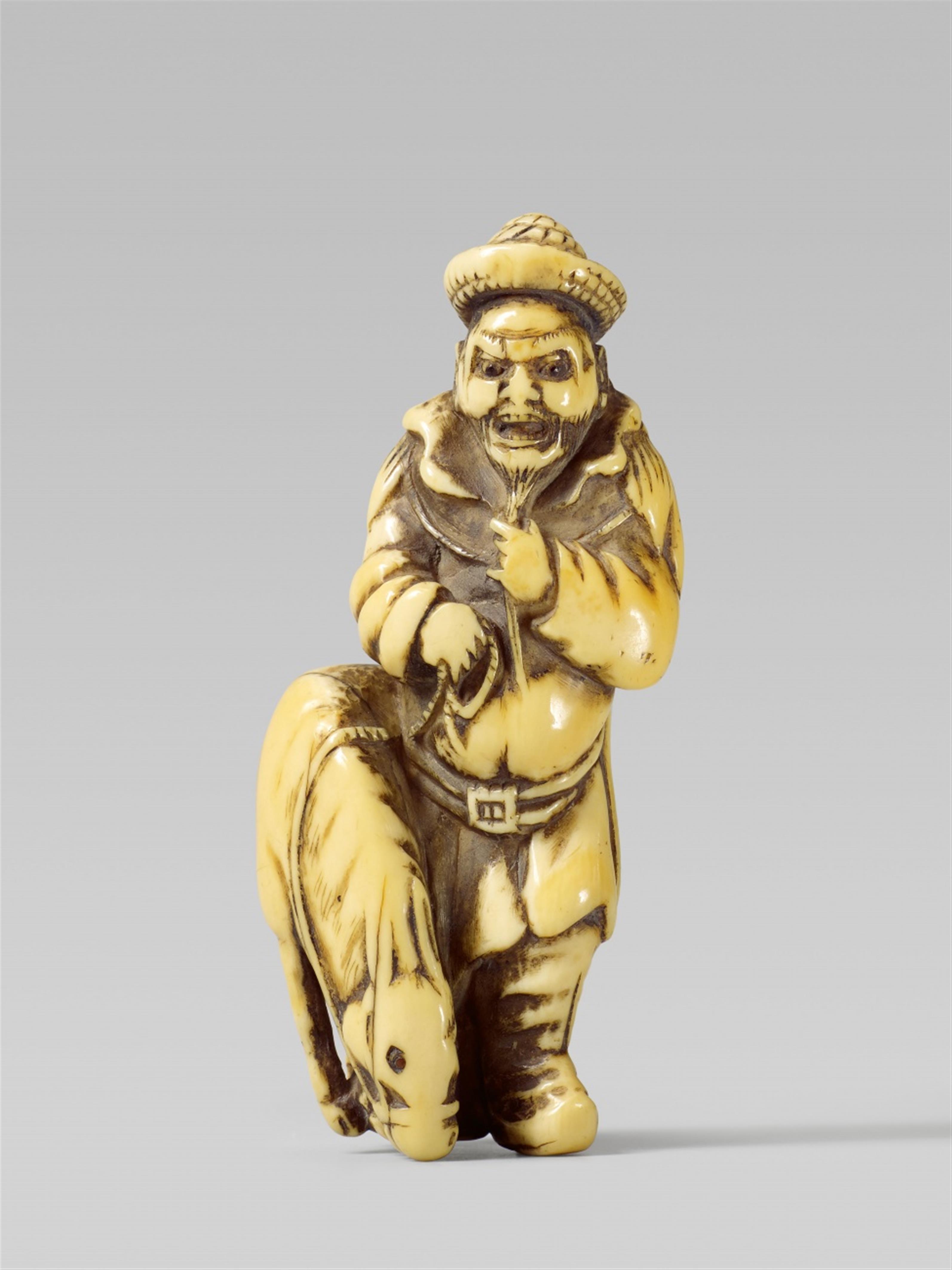 A good ivory netsuke of a Mongolian man with a horse. 18th century - image-1
