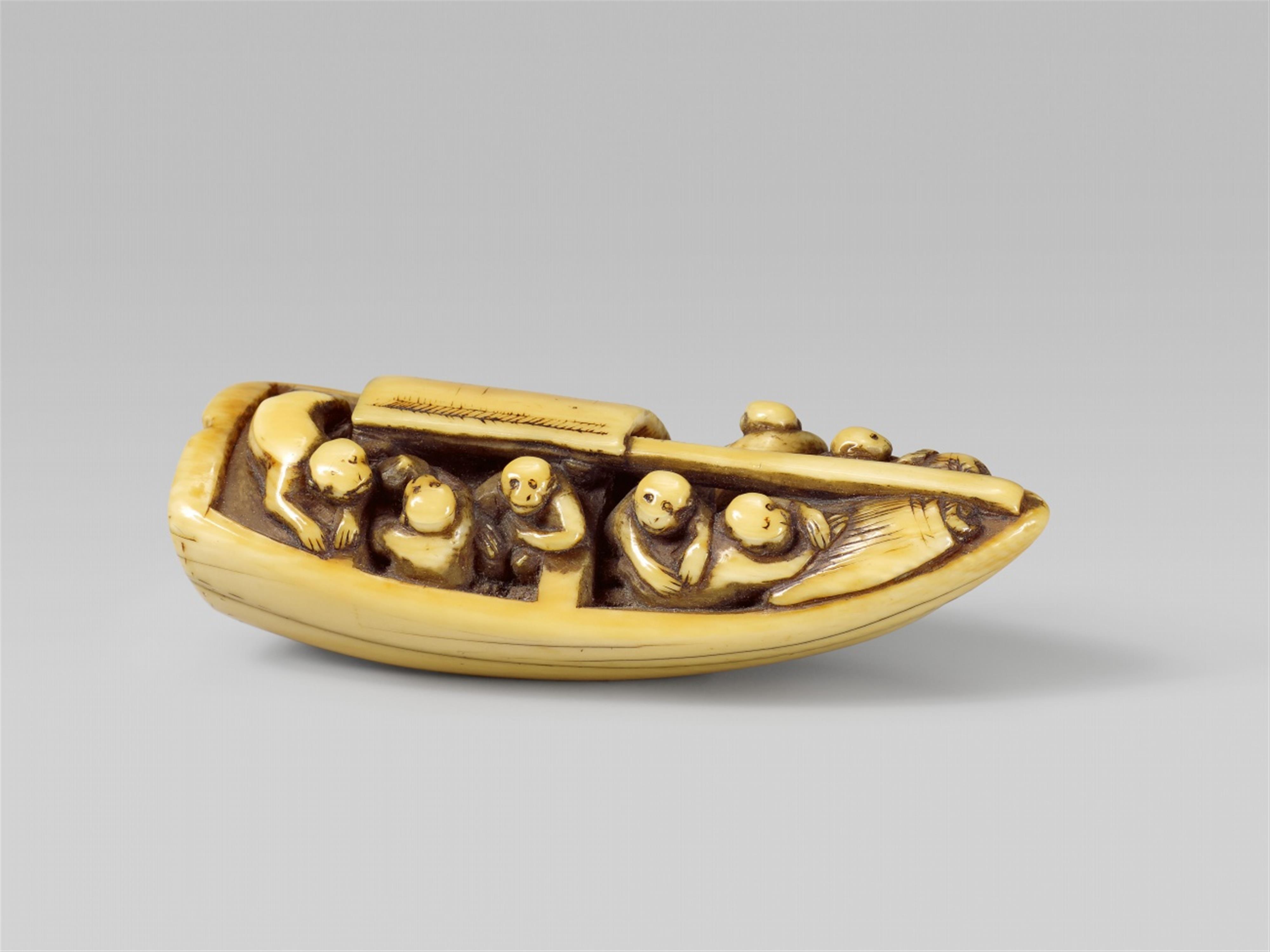 An ivory netsuke of seven monkeys in a boat. 18th century - image-1