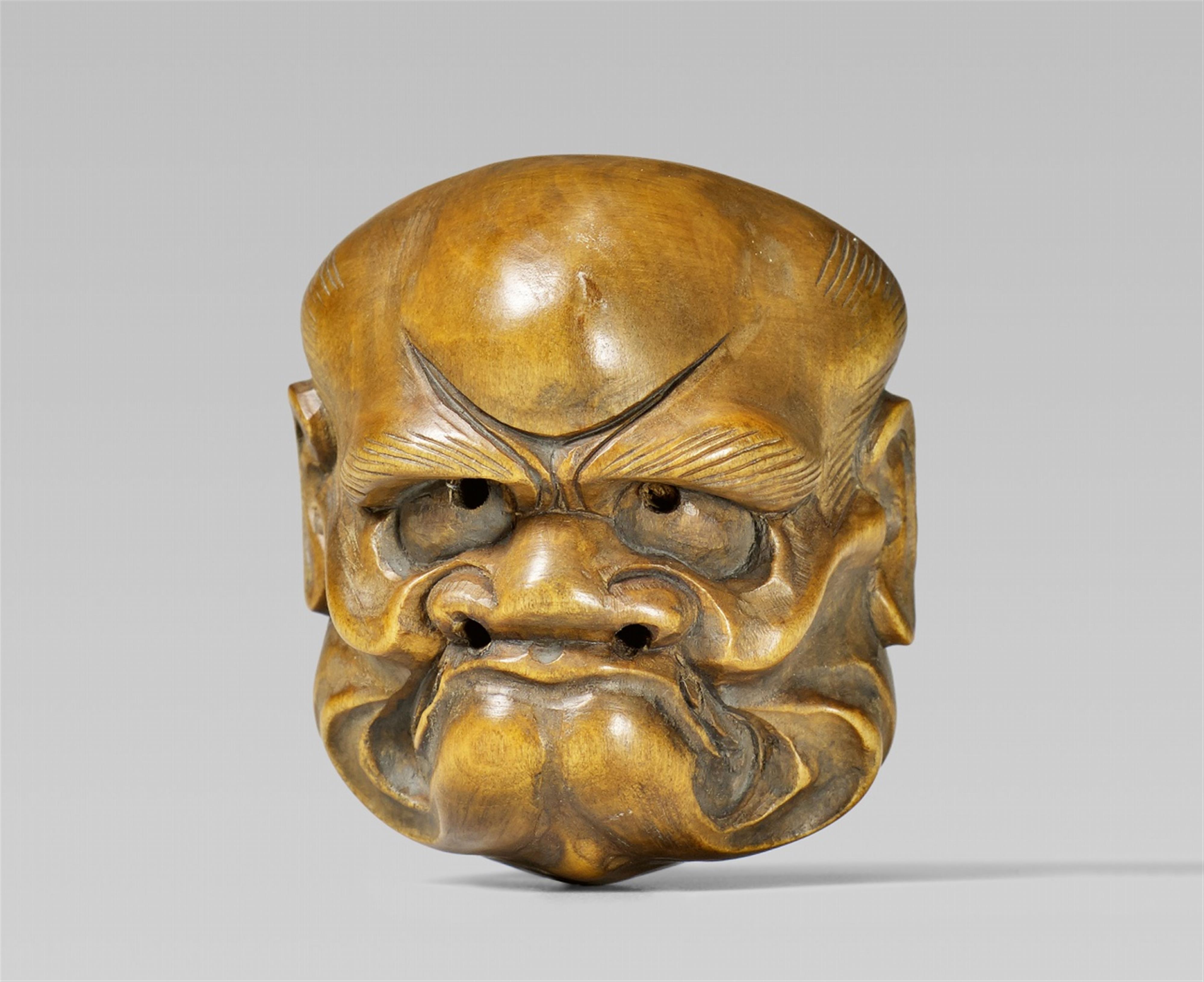 A light boxwood mask netsuke, by Akimasa (Meishô). Late 19th century - image-1