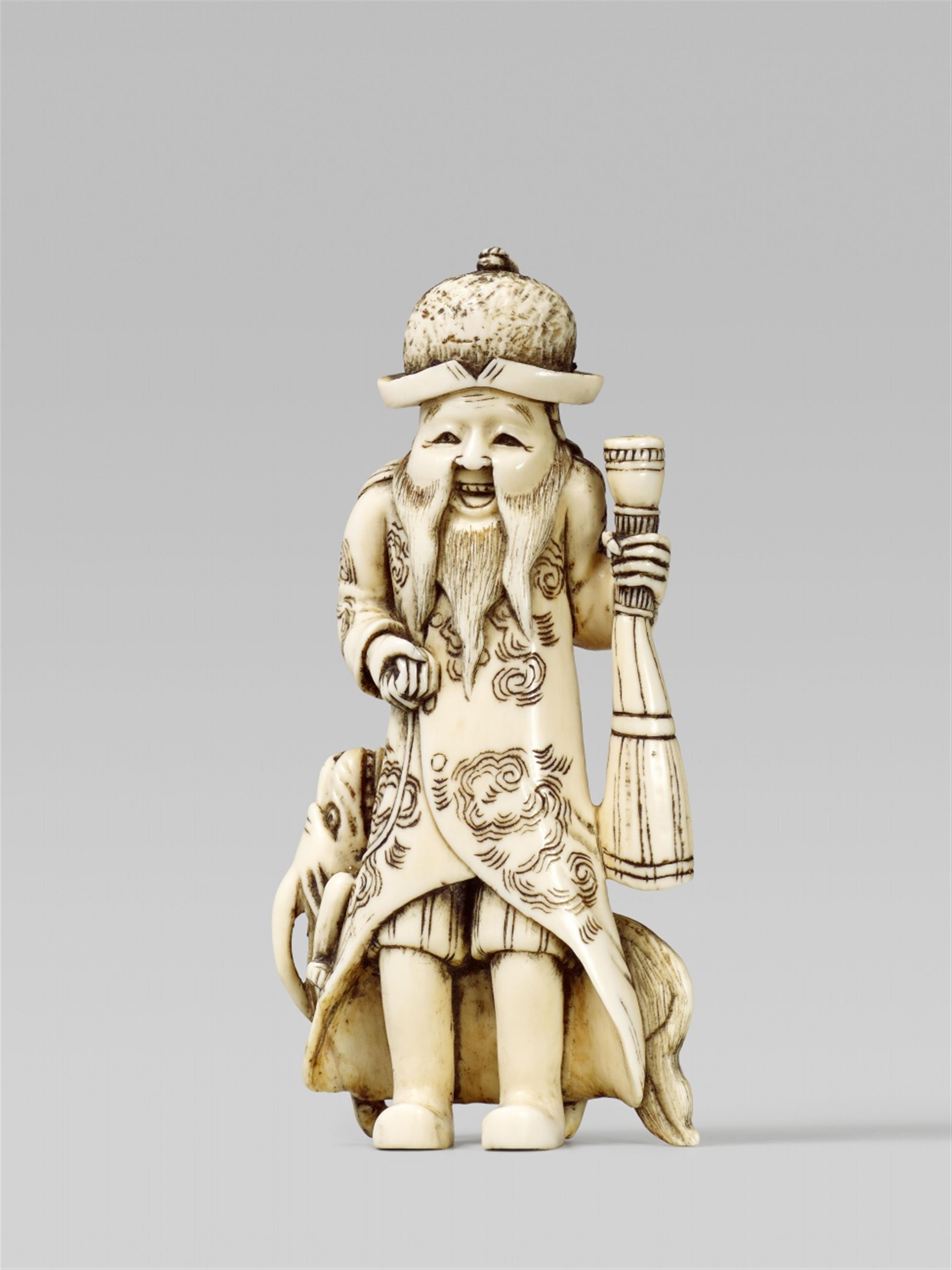 An ivory netsuke of a bearded Portugese man. Late 19th century - image-1