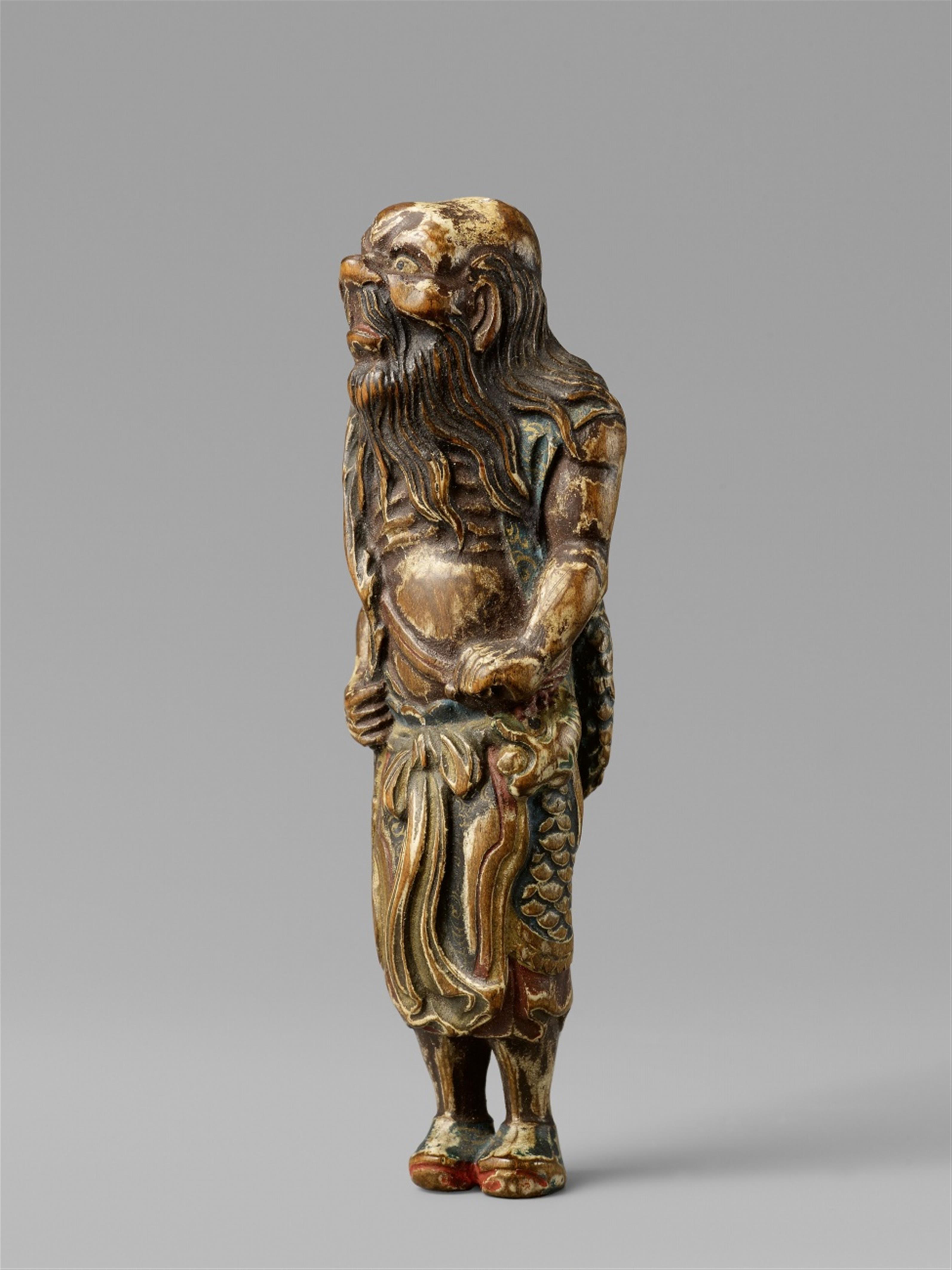 A polychromed wood netsuke of an attendant of Ryûjin. Late 19th century - image-1