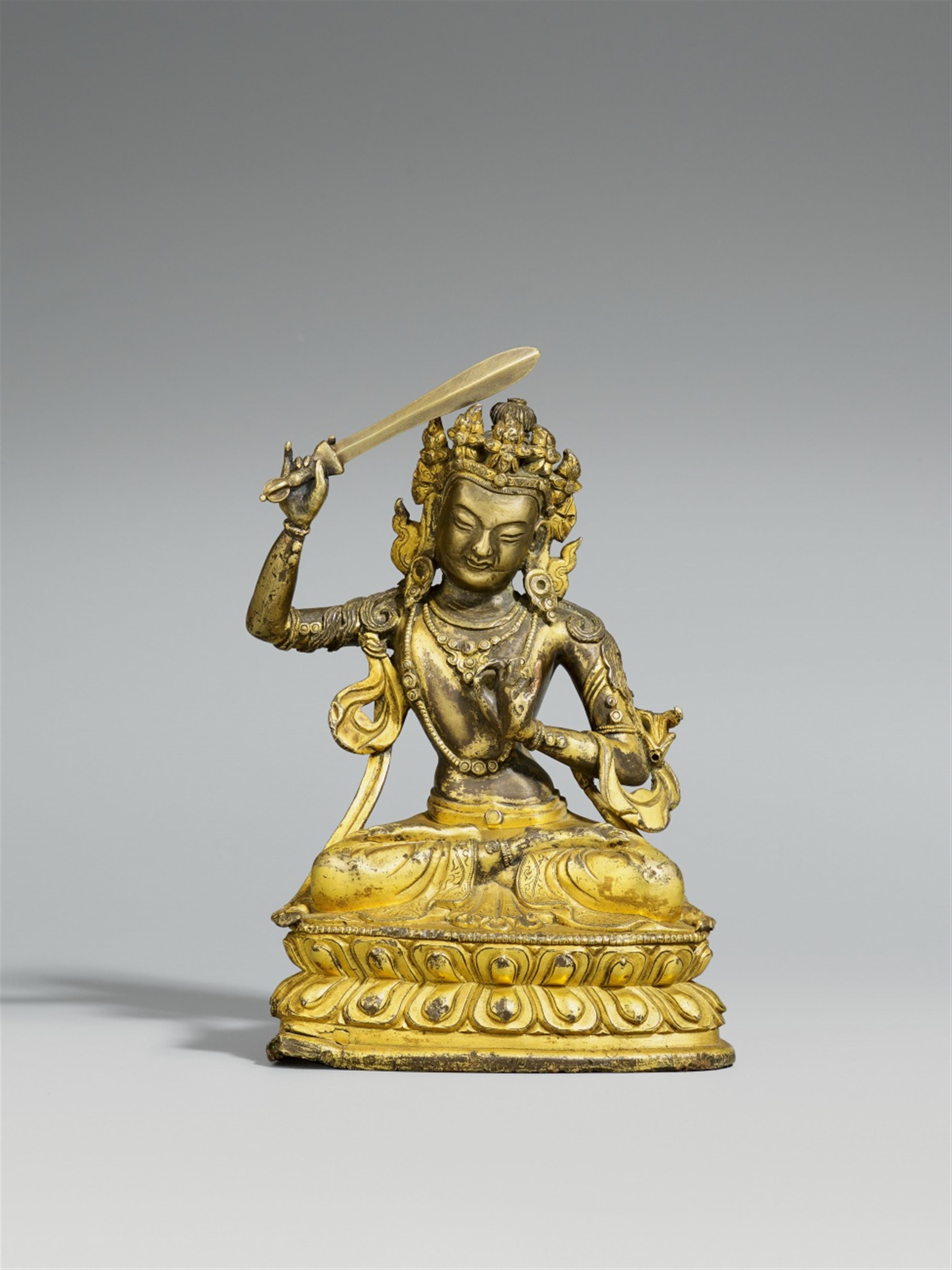 A Sinotibetan gilt bronze figure of Manjushri. 18th century - image-1