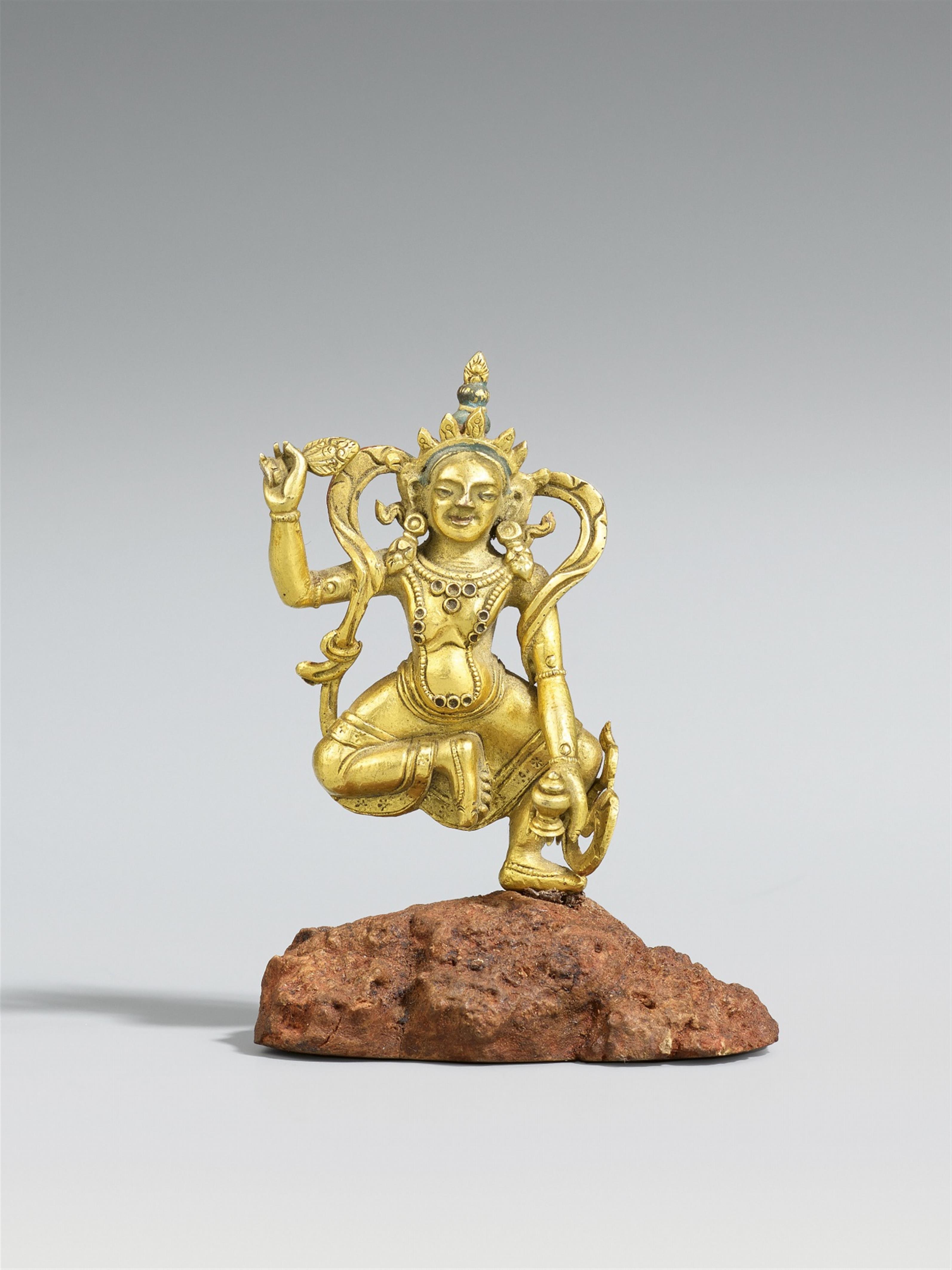 A Sinotibetan gilt bronze miniature figure of a dakini. 18th/19th century - image-1