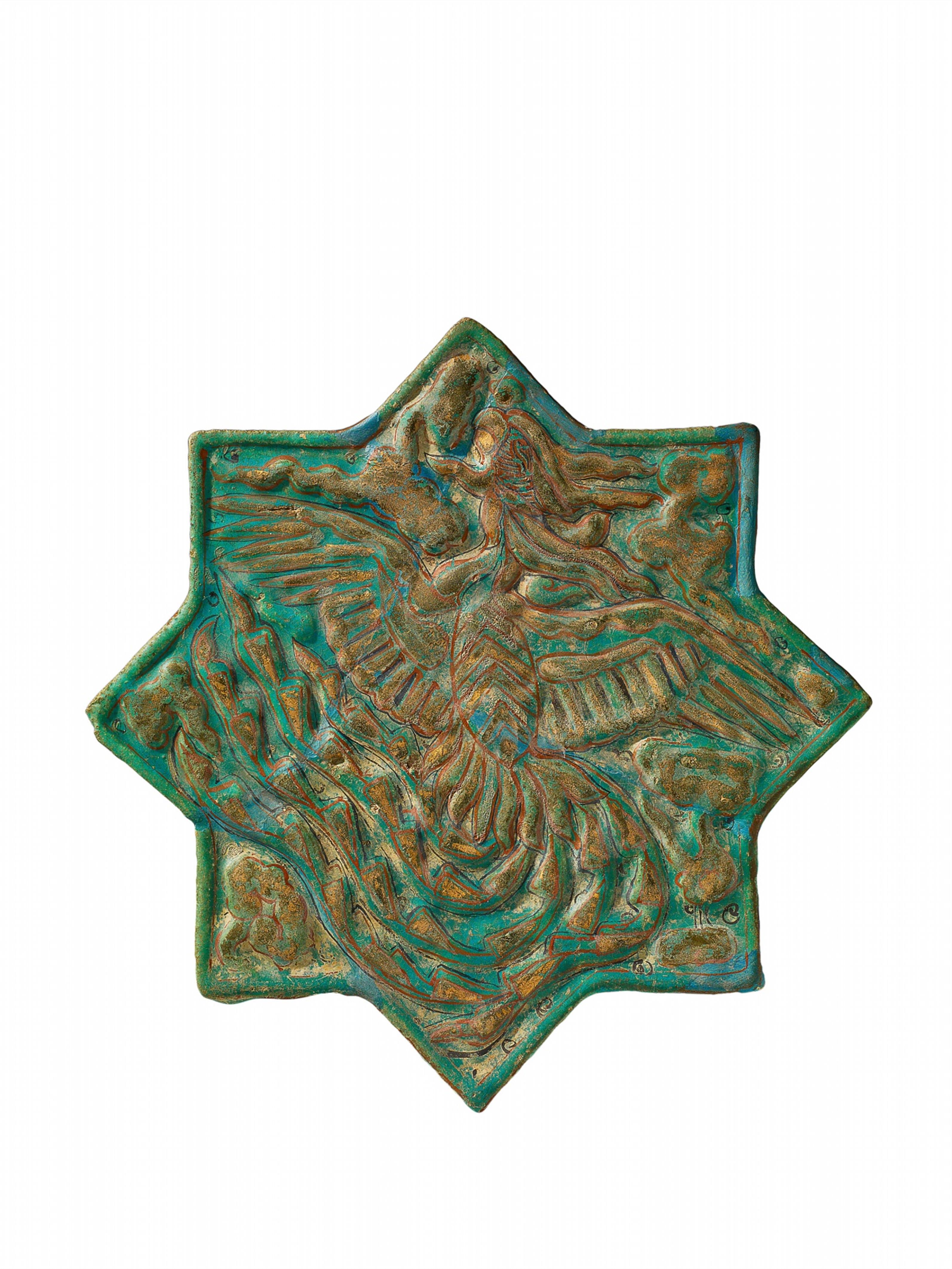 A star-shaped Iranian fritware tile with Lajvardina glaze - image-1