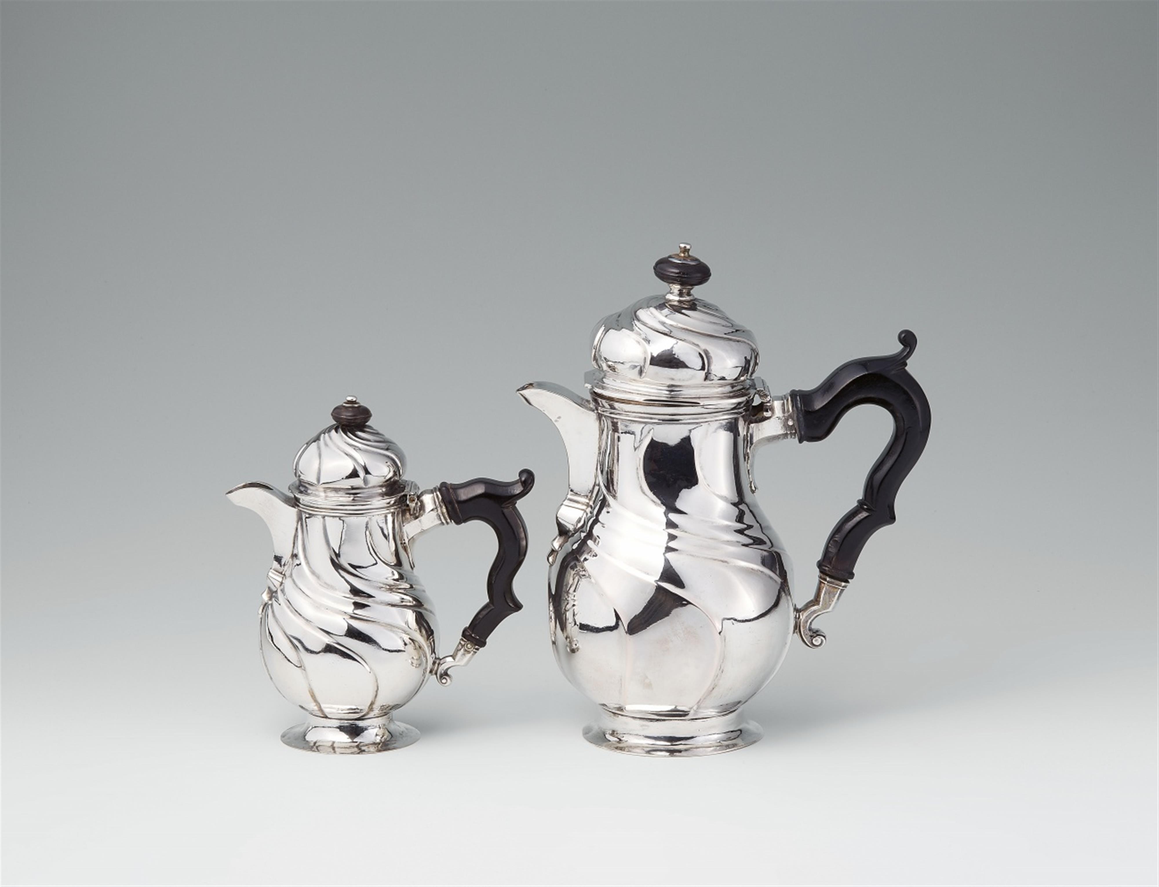A pair of Osnabrück silver jugs - image-1