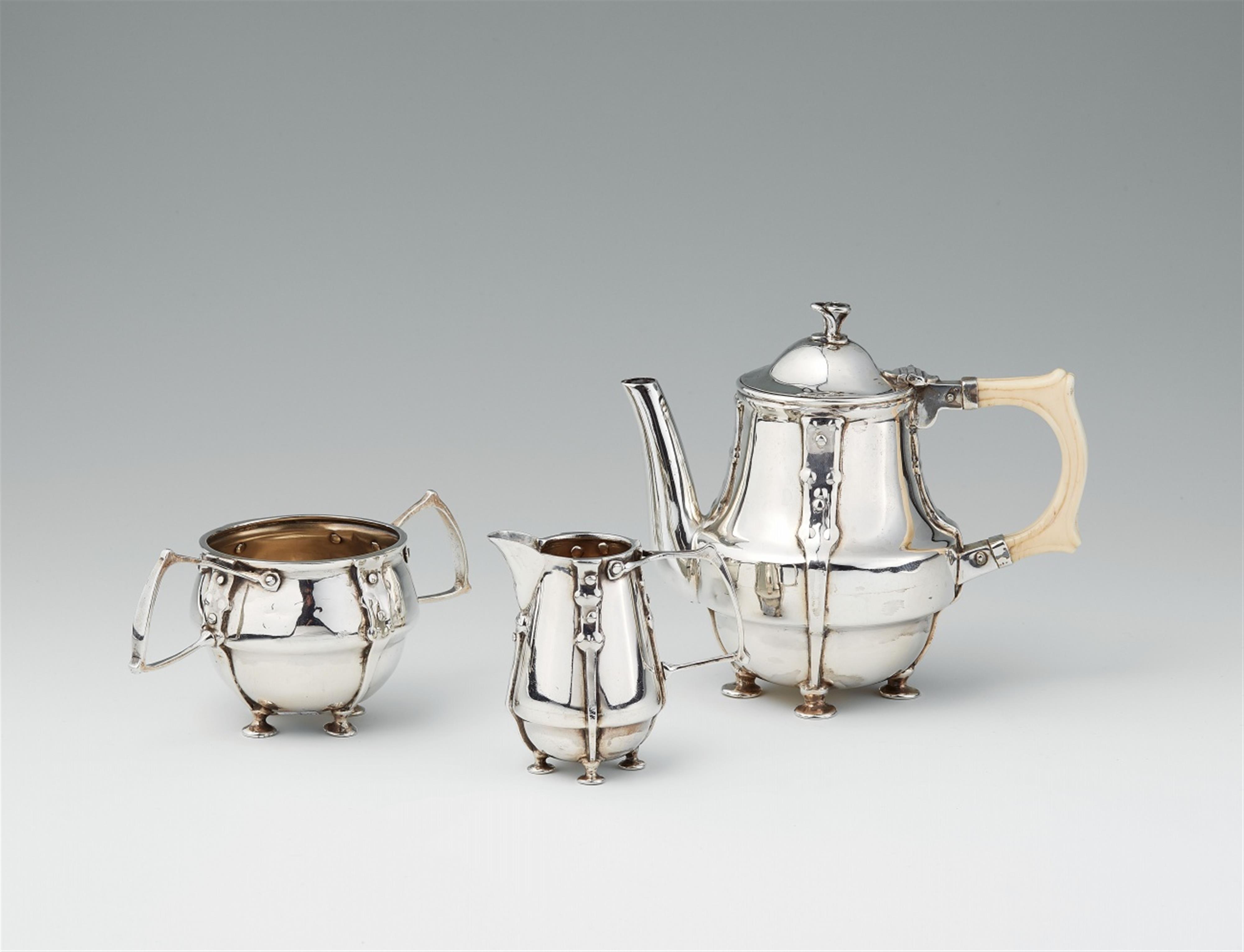 An Arts & Crafts silver tea service - image-4