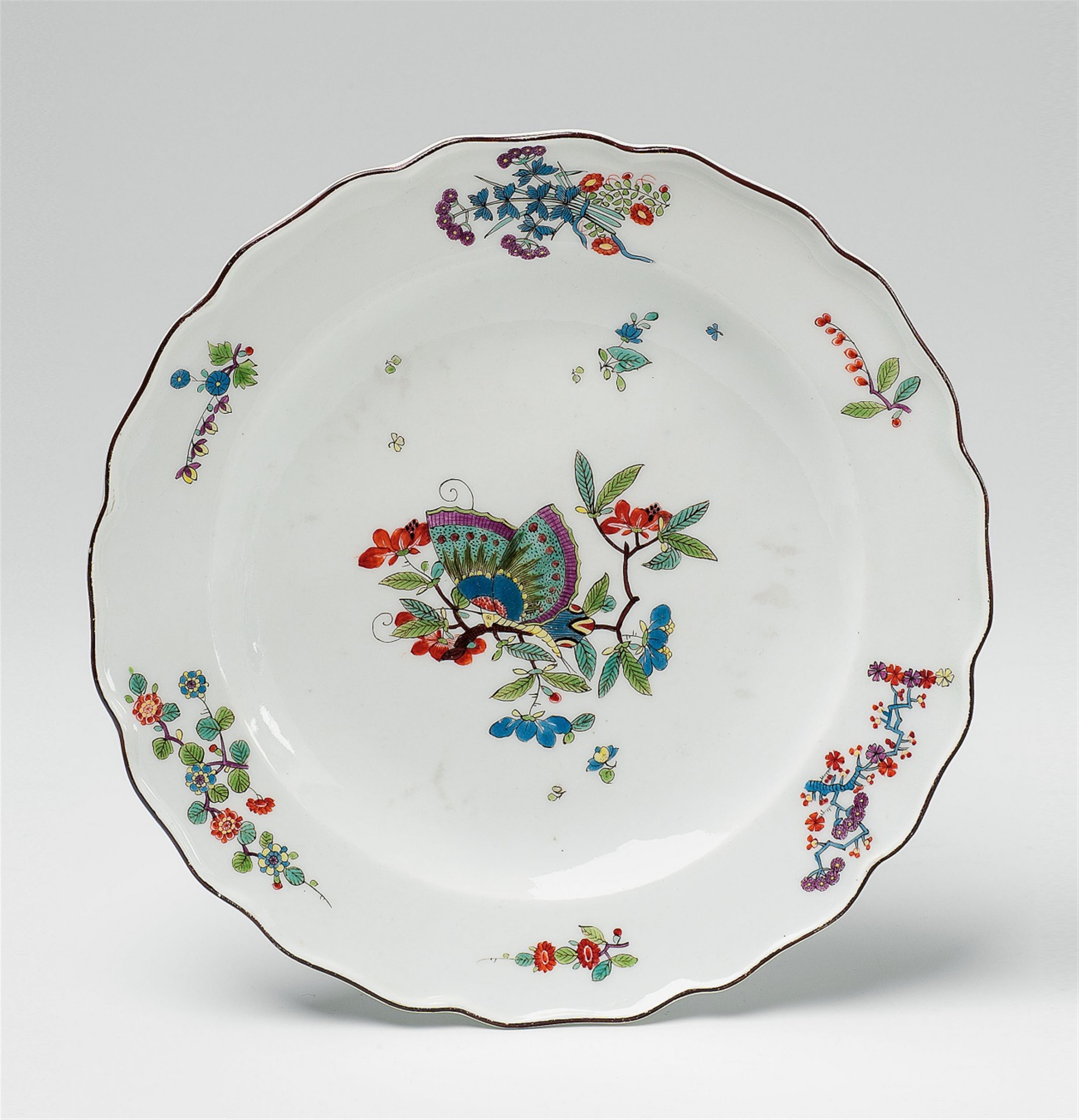 A Meissen porcelain plate with butterfly decor - image-1