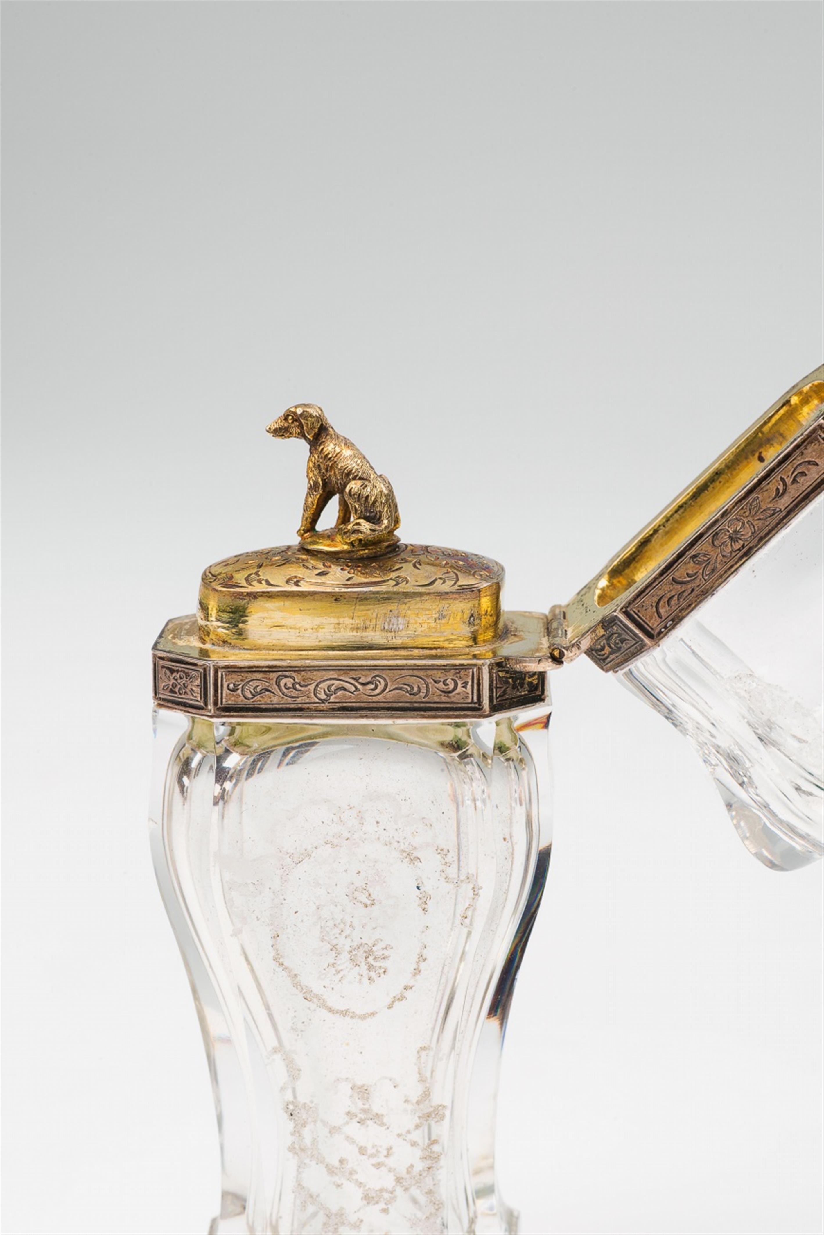 A Parisian vermeil mounted rock crystal bottle with a seated dog - image-2