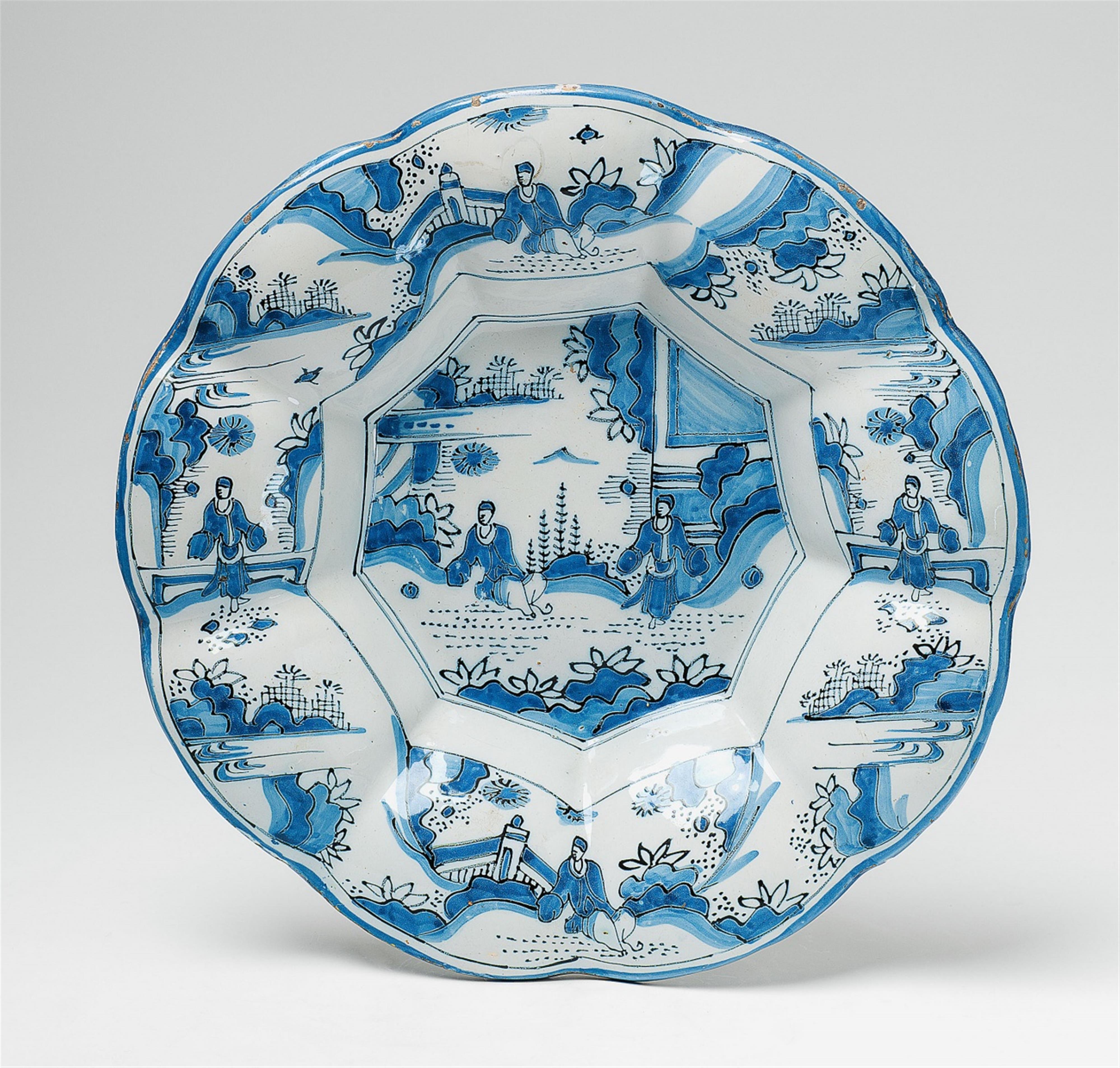 A gadrooned Delft faience charger with Chinoiserie decor - image-1