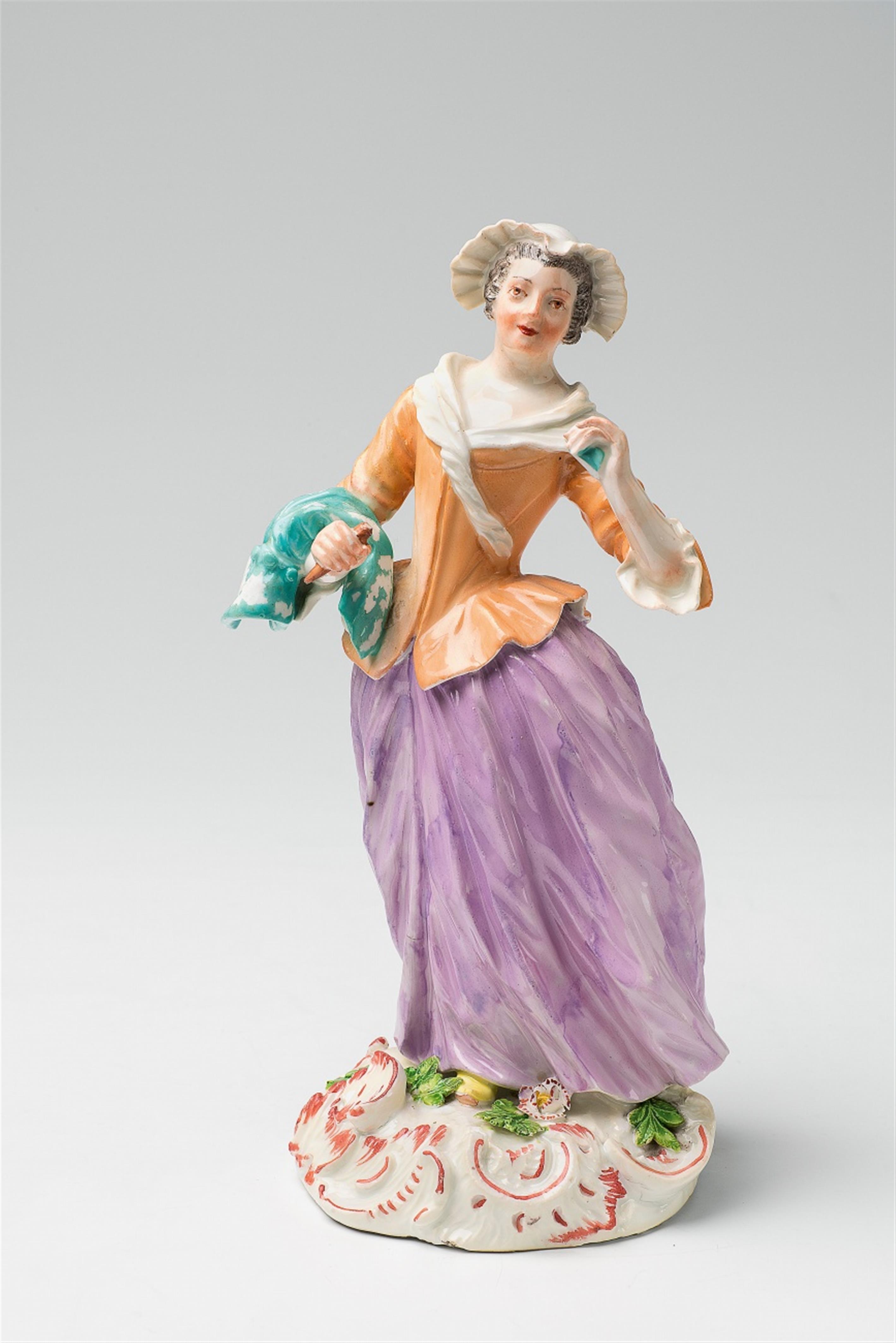 A Meissen porcelain figure of a seamstress - image-1