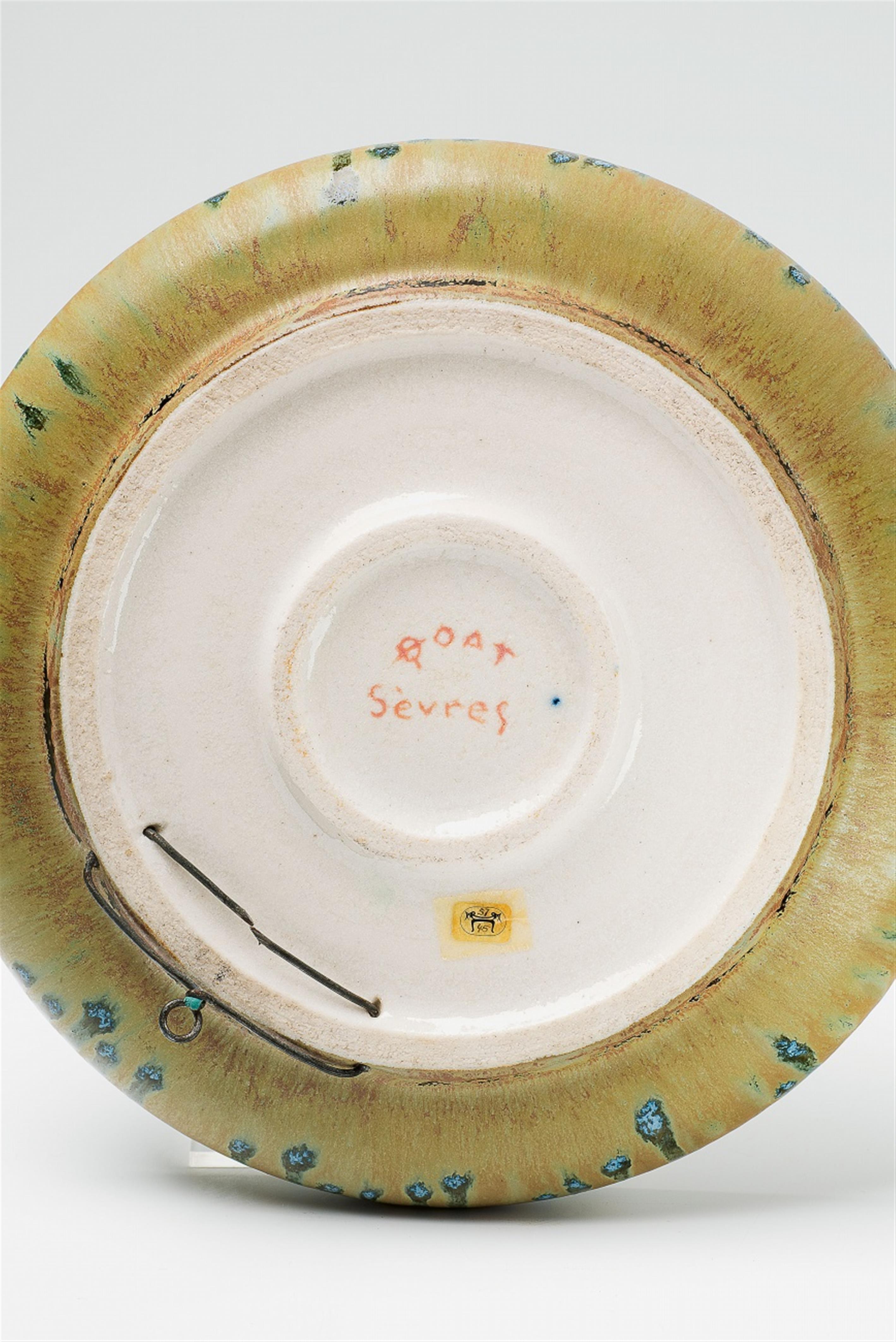 A Sèvres porcelain dish with Cupid by Taxile Doat - image-3