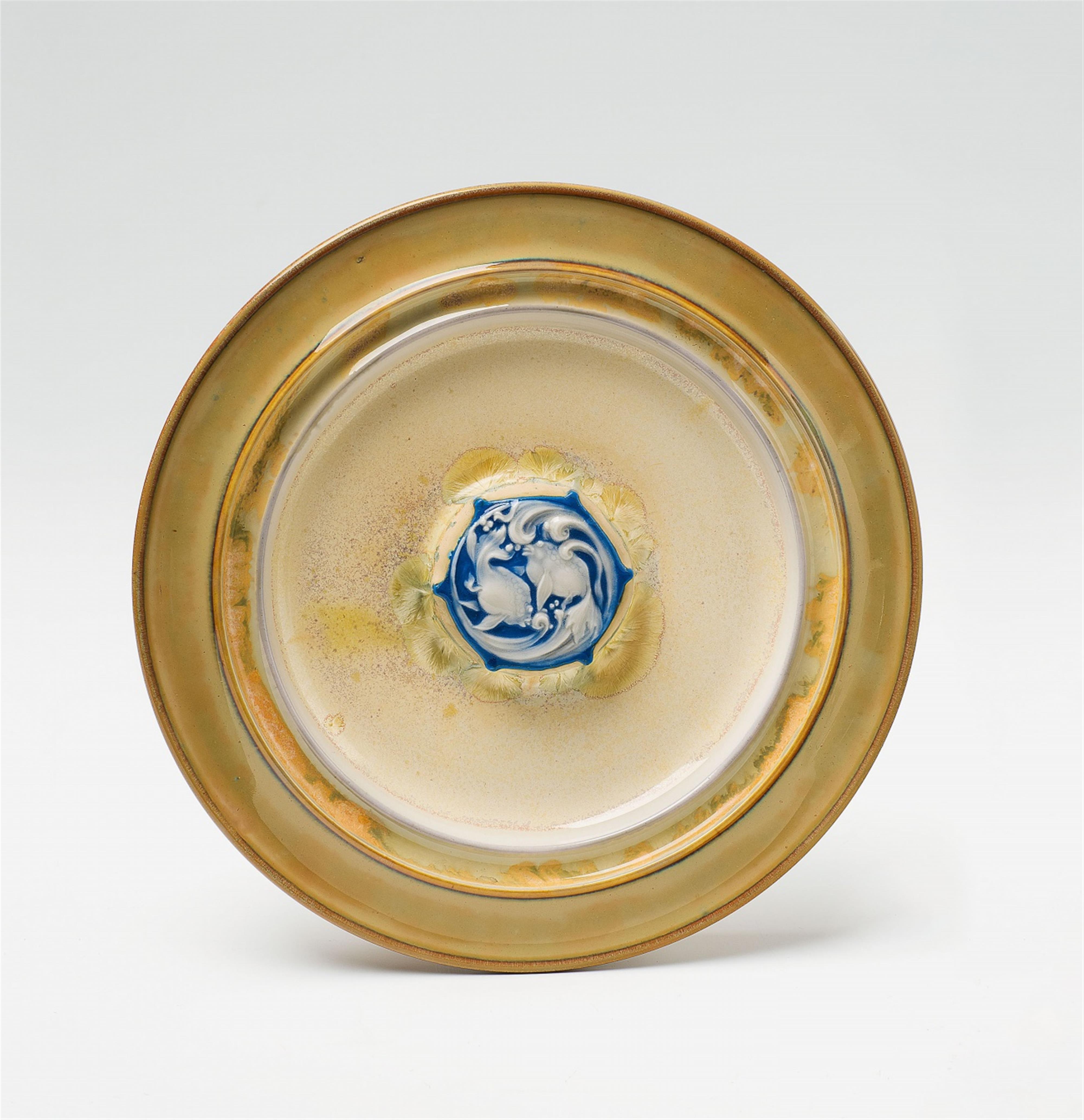 A Sèvres porcelain plate with fish decor by Taxile Doat - image-1