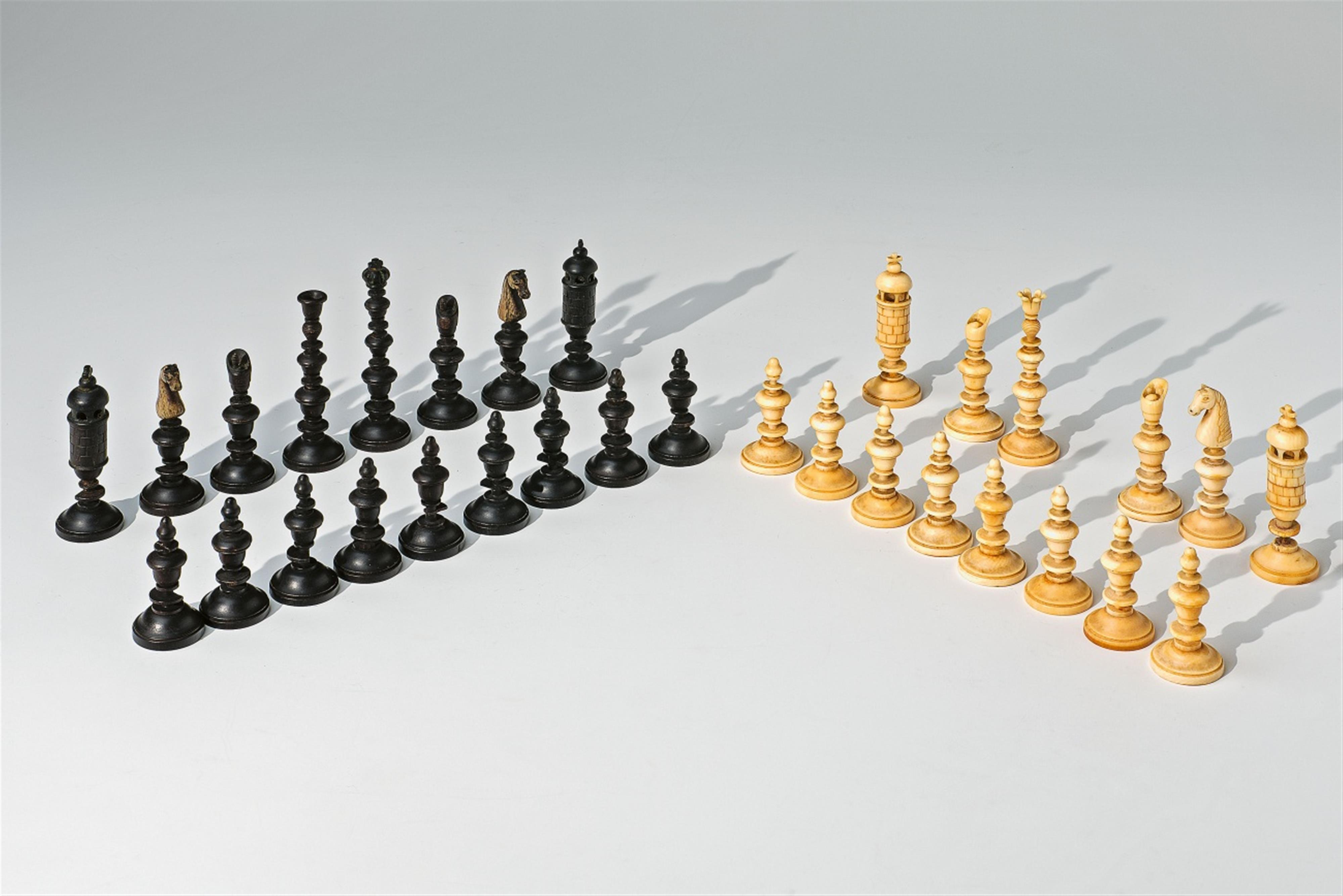 31 ebony and ivory chess pieces - image-1