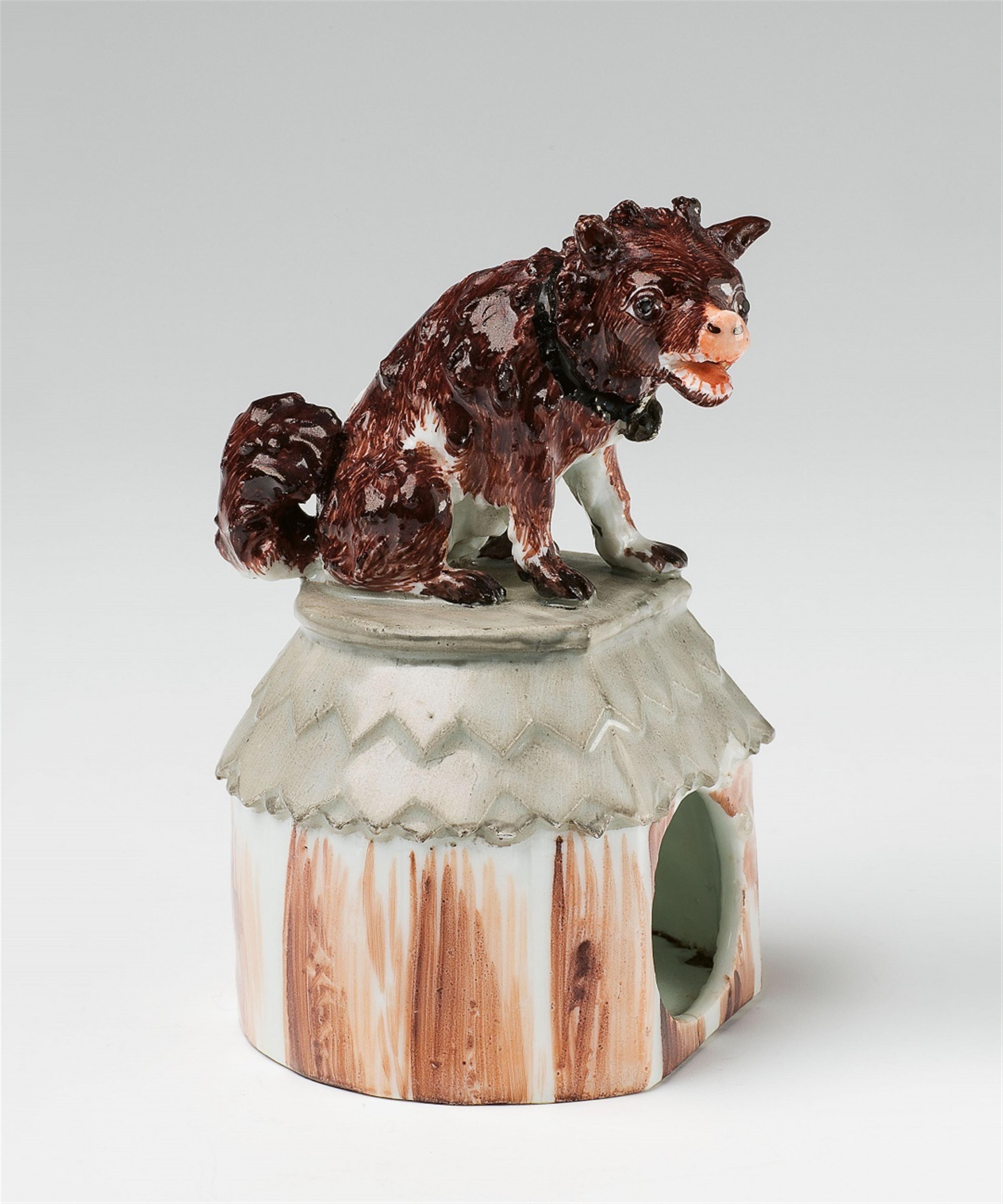 A Meissen porcelain model of a watchdog sitting on its kennel - image-1