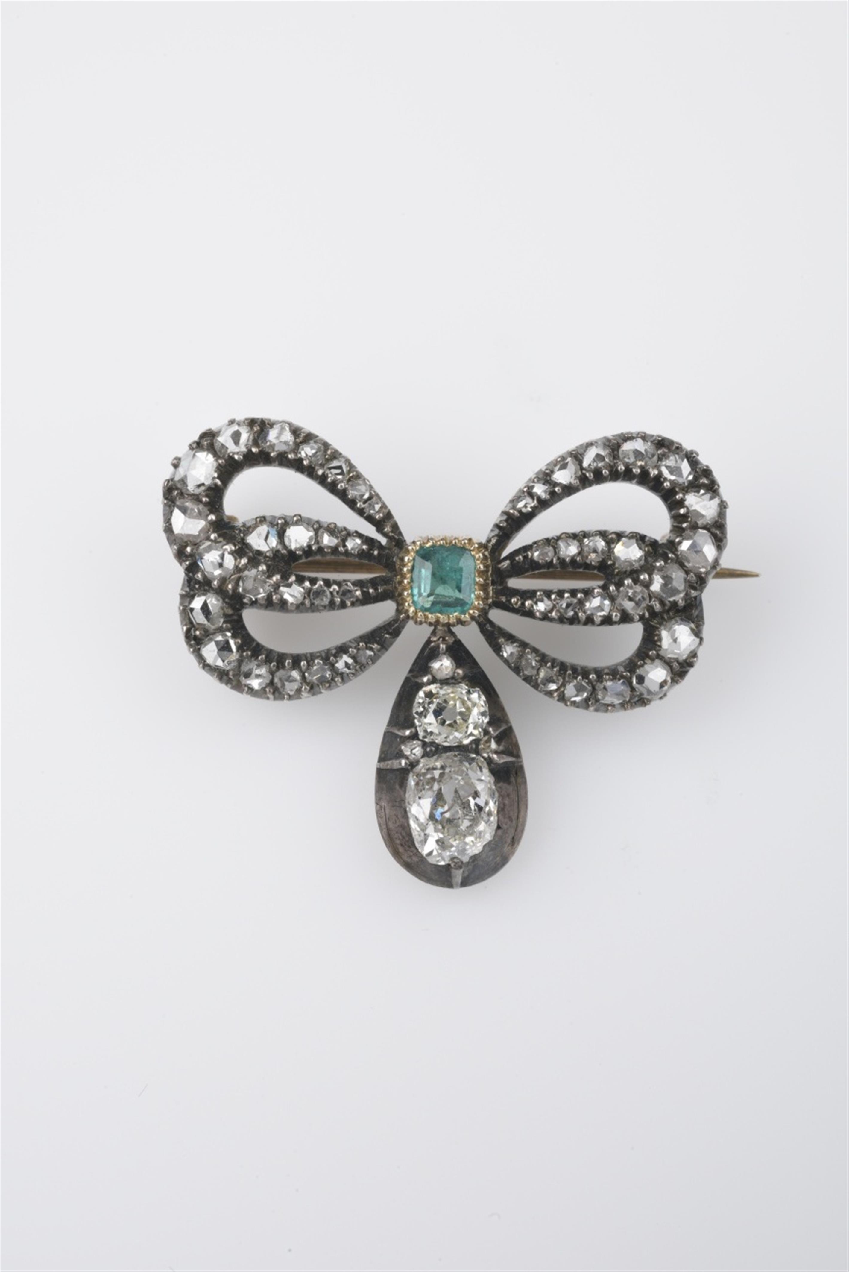 A small 14k gold and silver Sevigné brooch - image-1