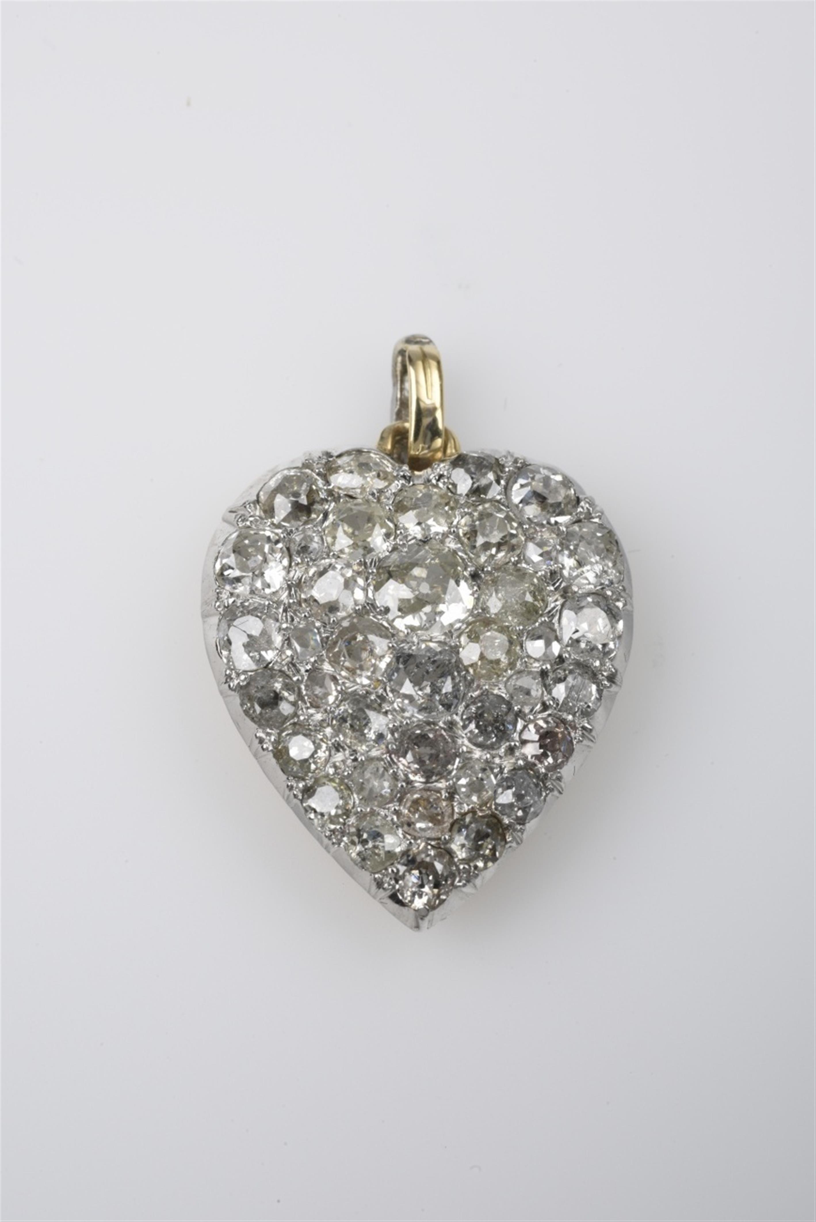 A Victorian 14k gold and platinum heart pendant - image-1
