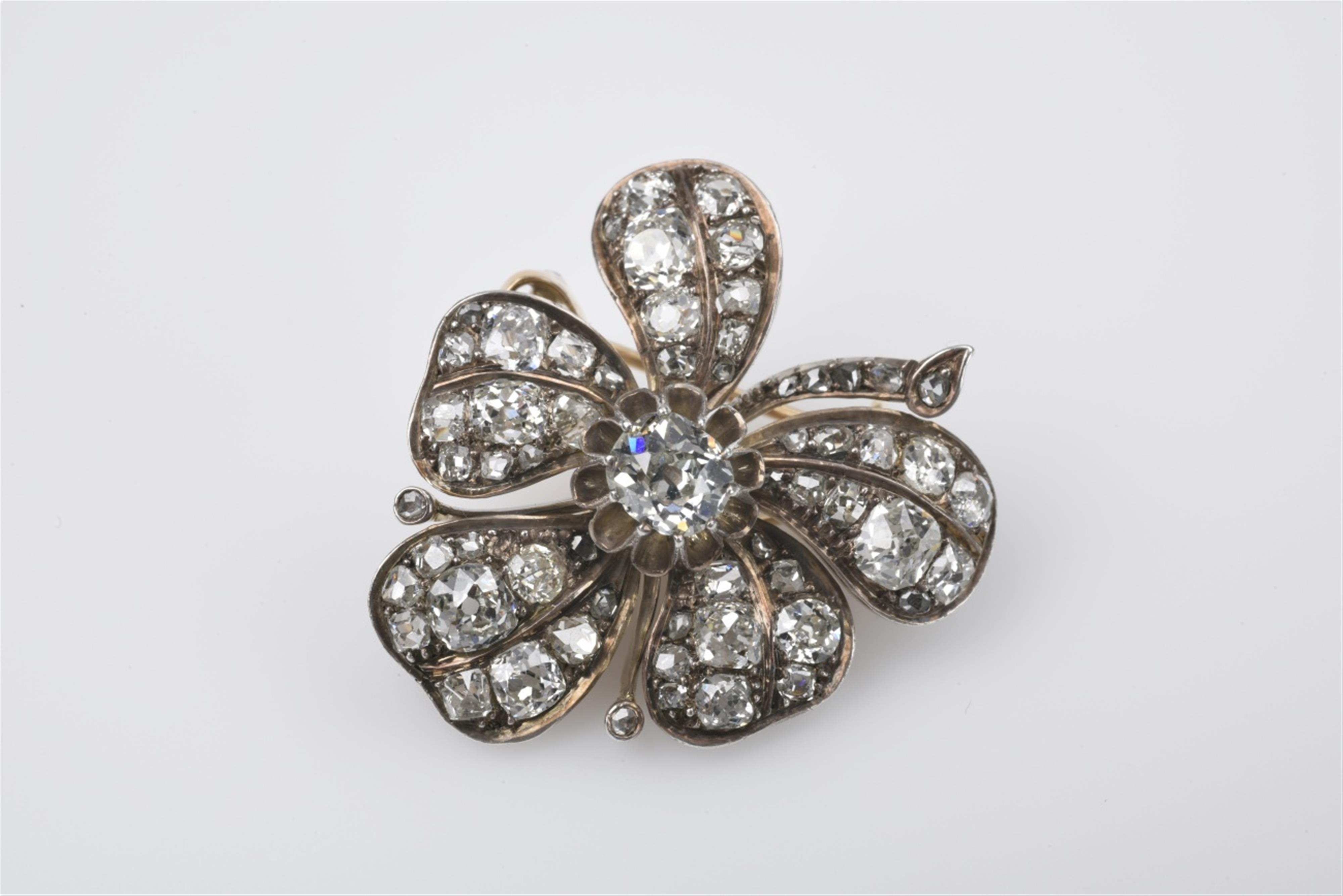 A silver, gold, and diamond brooch - image-1