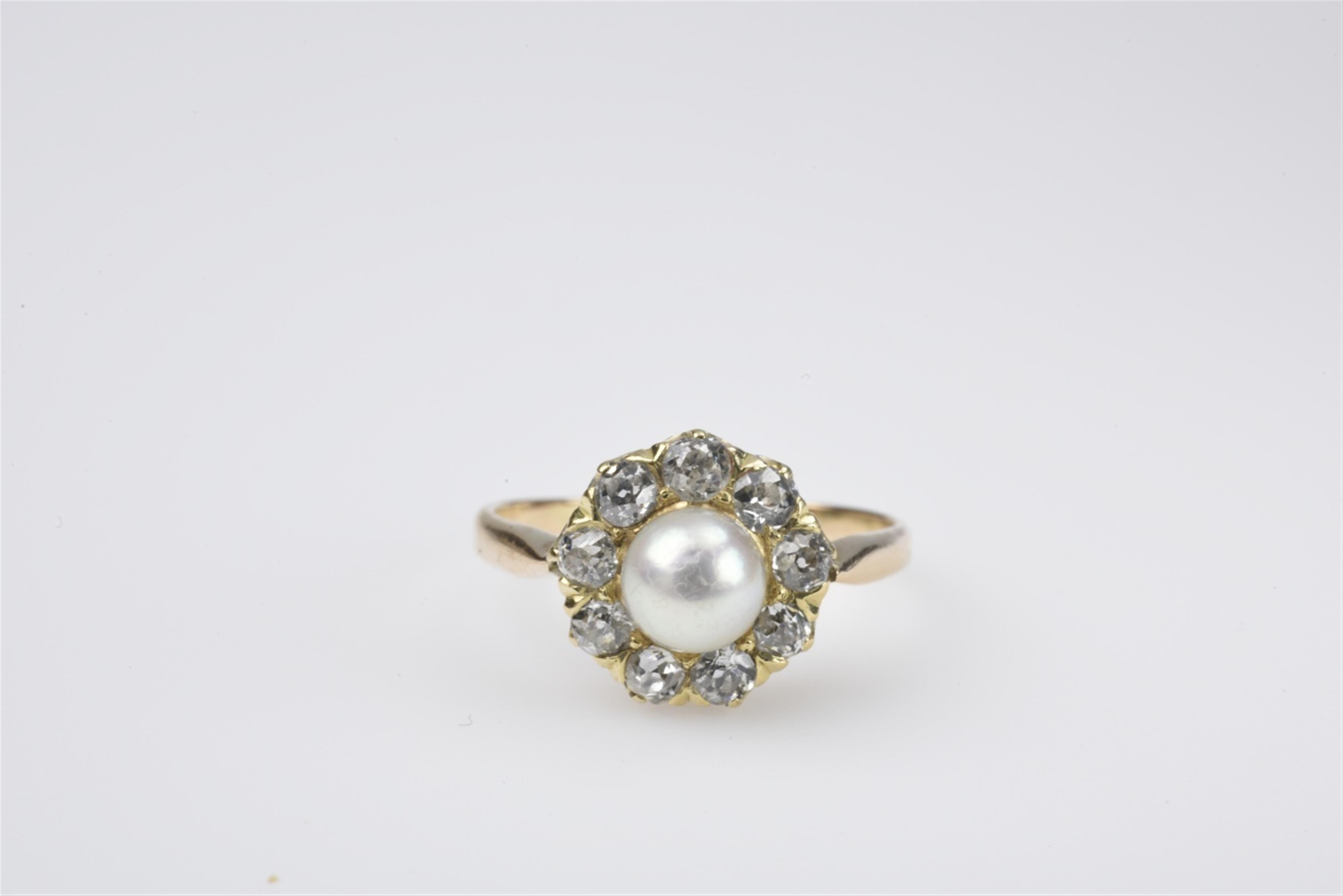 A 14k gold, platinum and pearl cluster ring - image-1