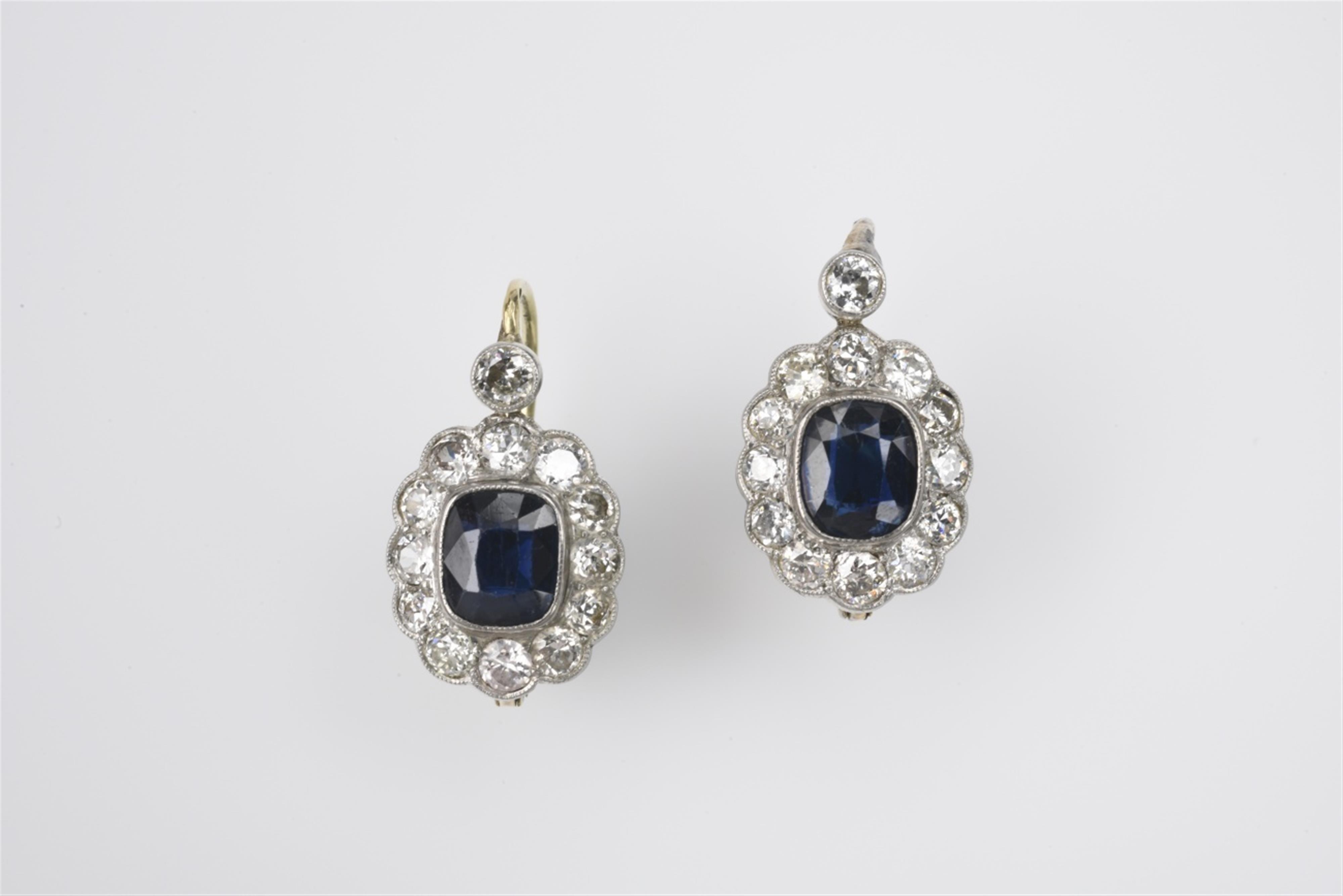 A pair of 14k gold, platinum, and sapphire pendant earrings - image-1