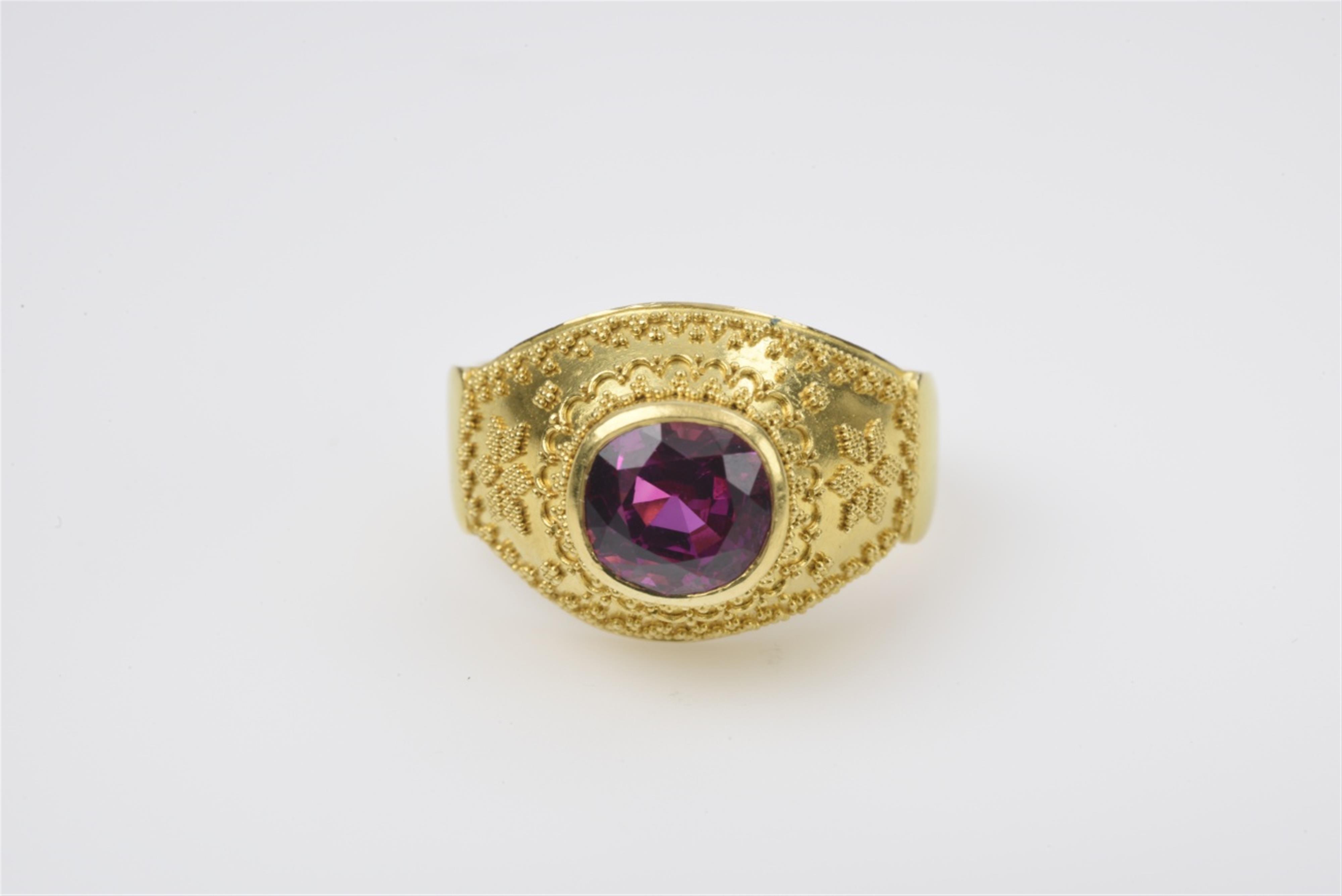 An 18/21k gold and pink sapphire ring by Hans Schott - image-4