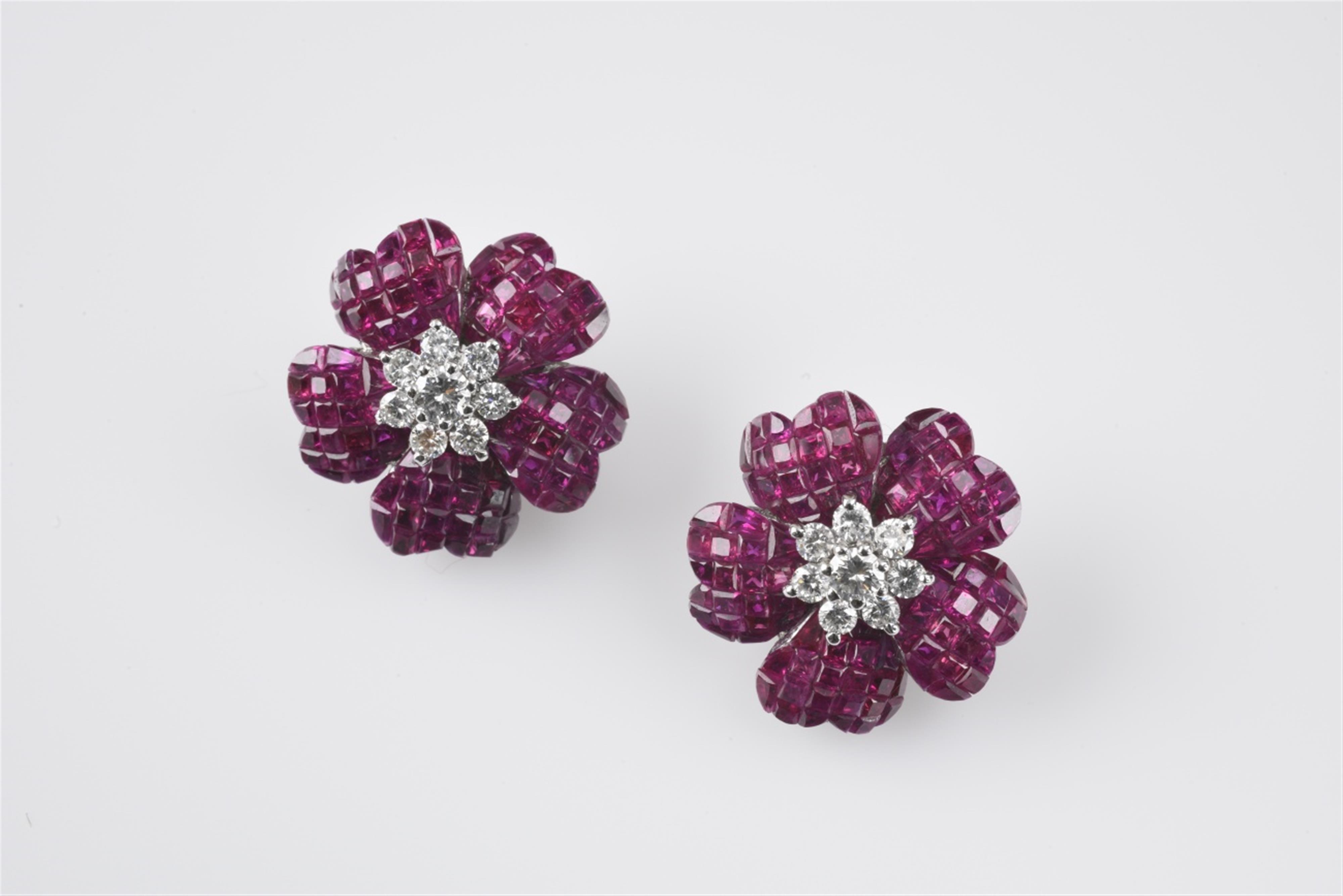 A pair of 18k white gold floral clip earrings - image-1