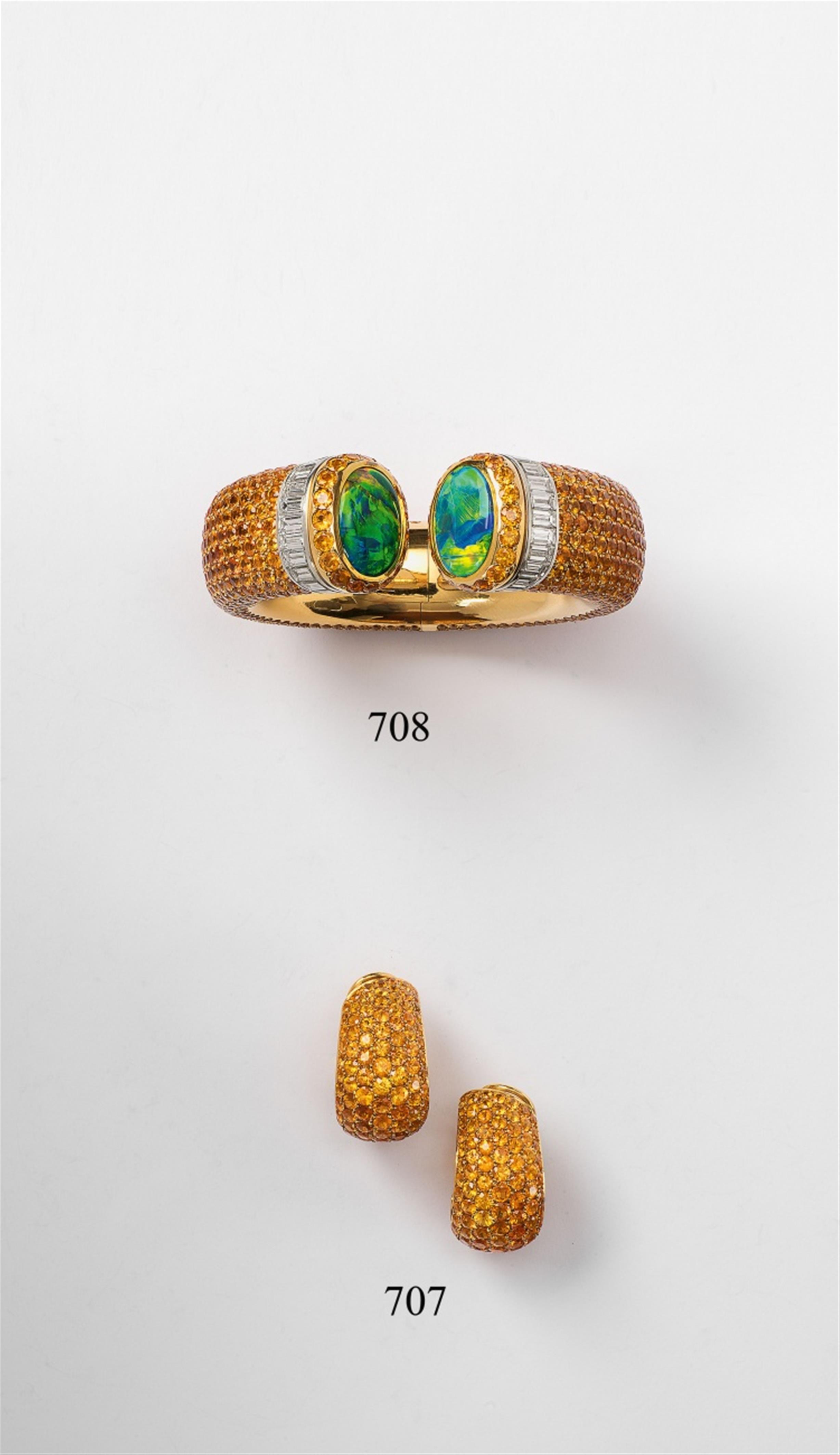 A pair of 18k gold and mandarin garnet earrings - image-2
