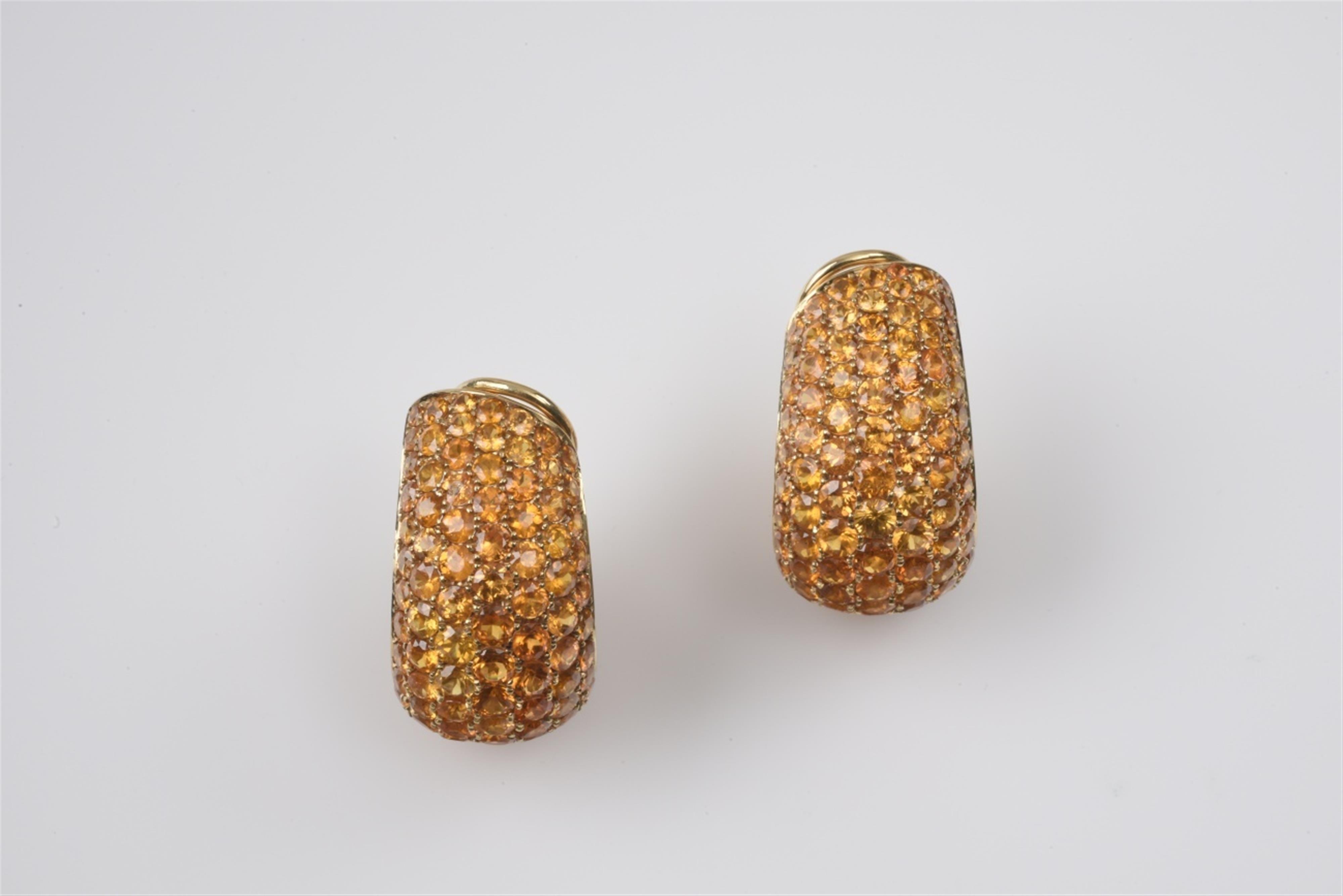 A pair of 18k gold and mandarin garnet earrings - image-1