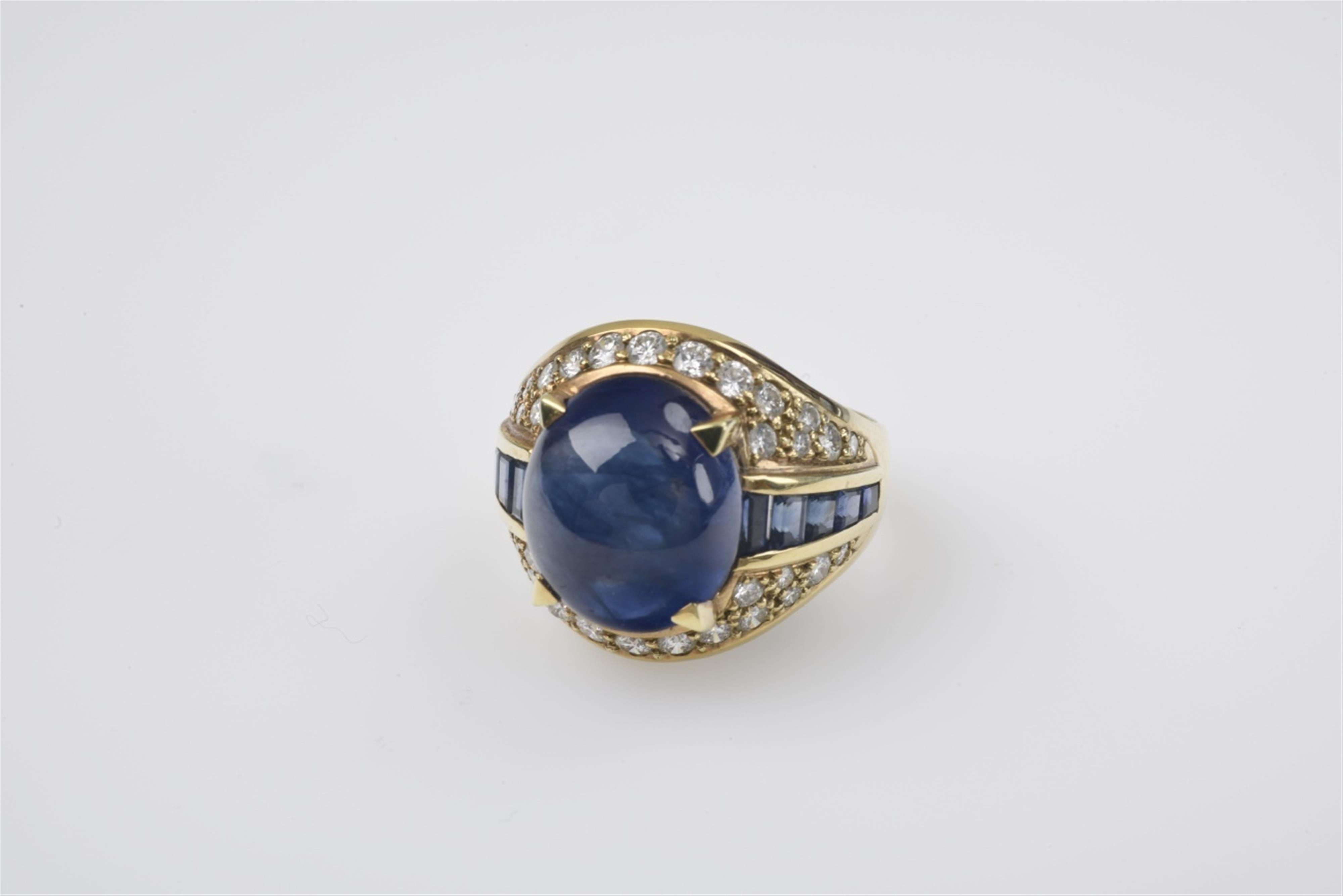 A 14k gold and sapphire ring - image-1
