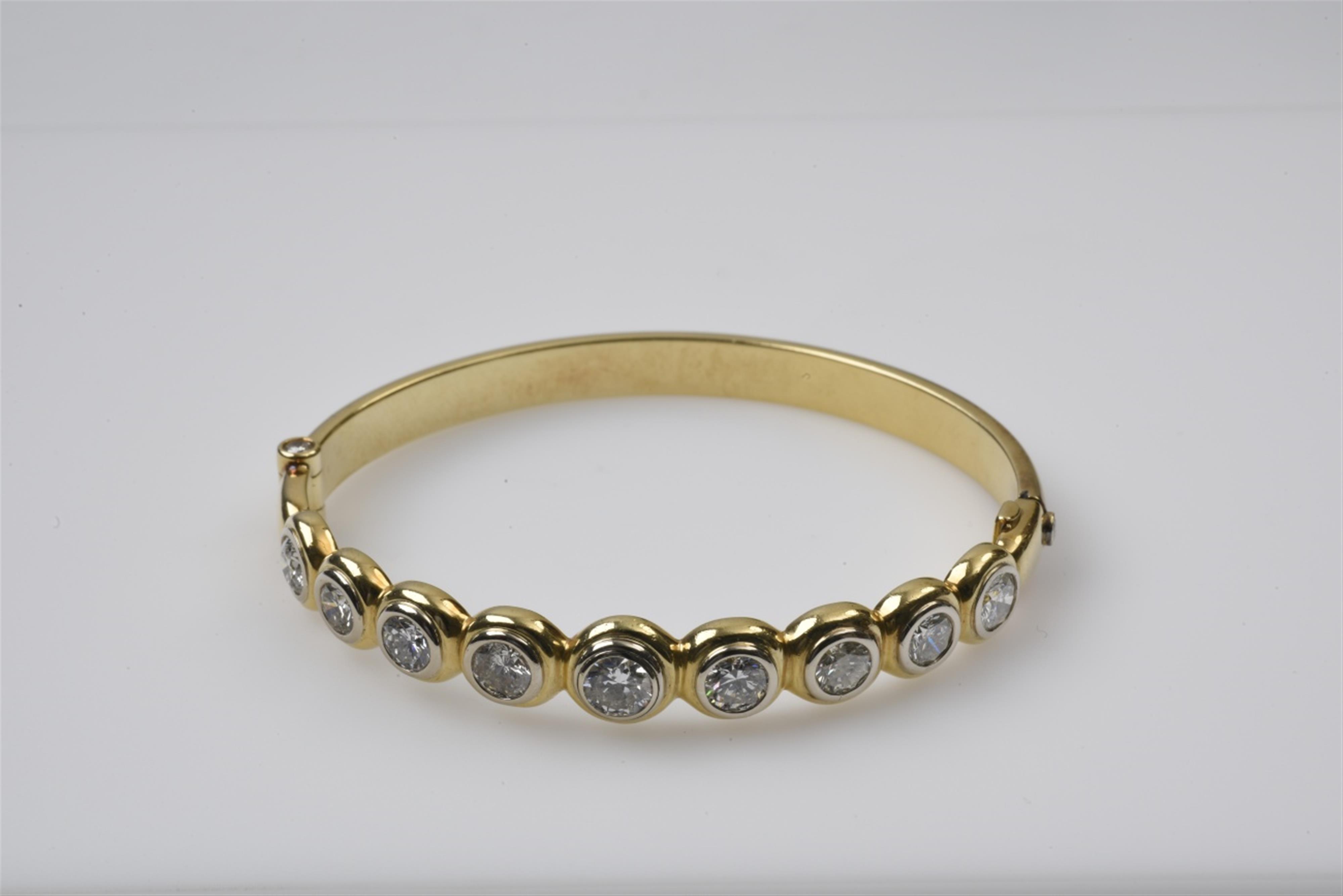 An 18k gold and diamond bracelet - image-1
