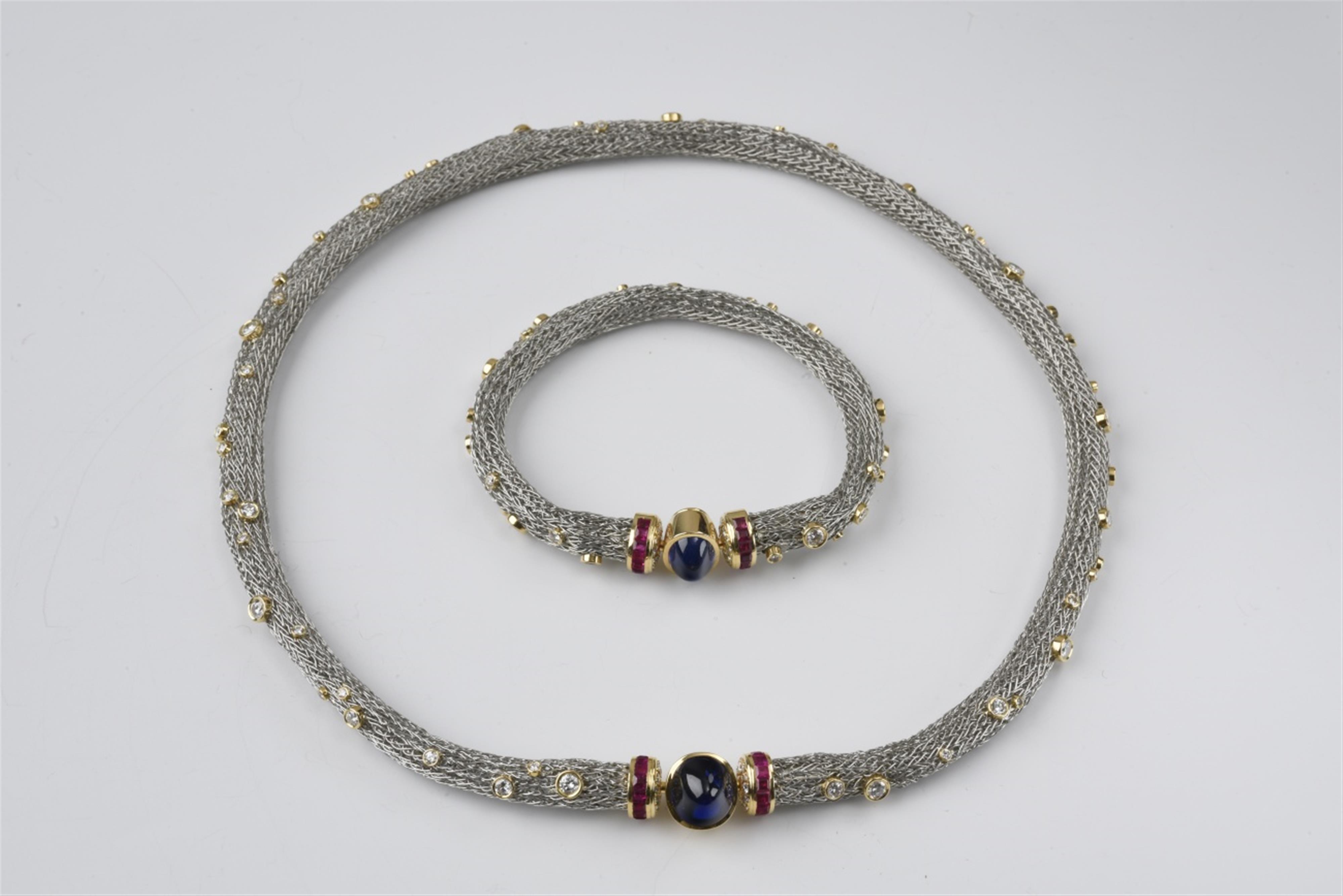 An 18k gold and sapphire demi-parure - image-1