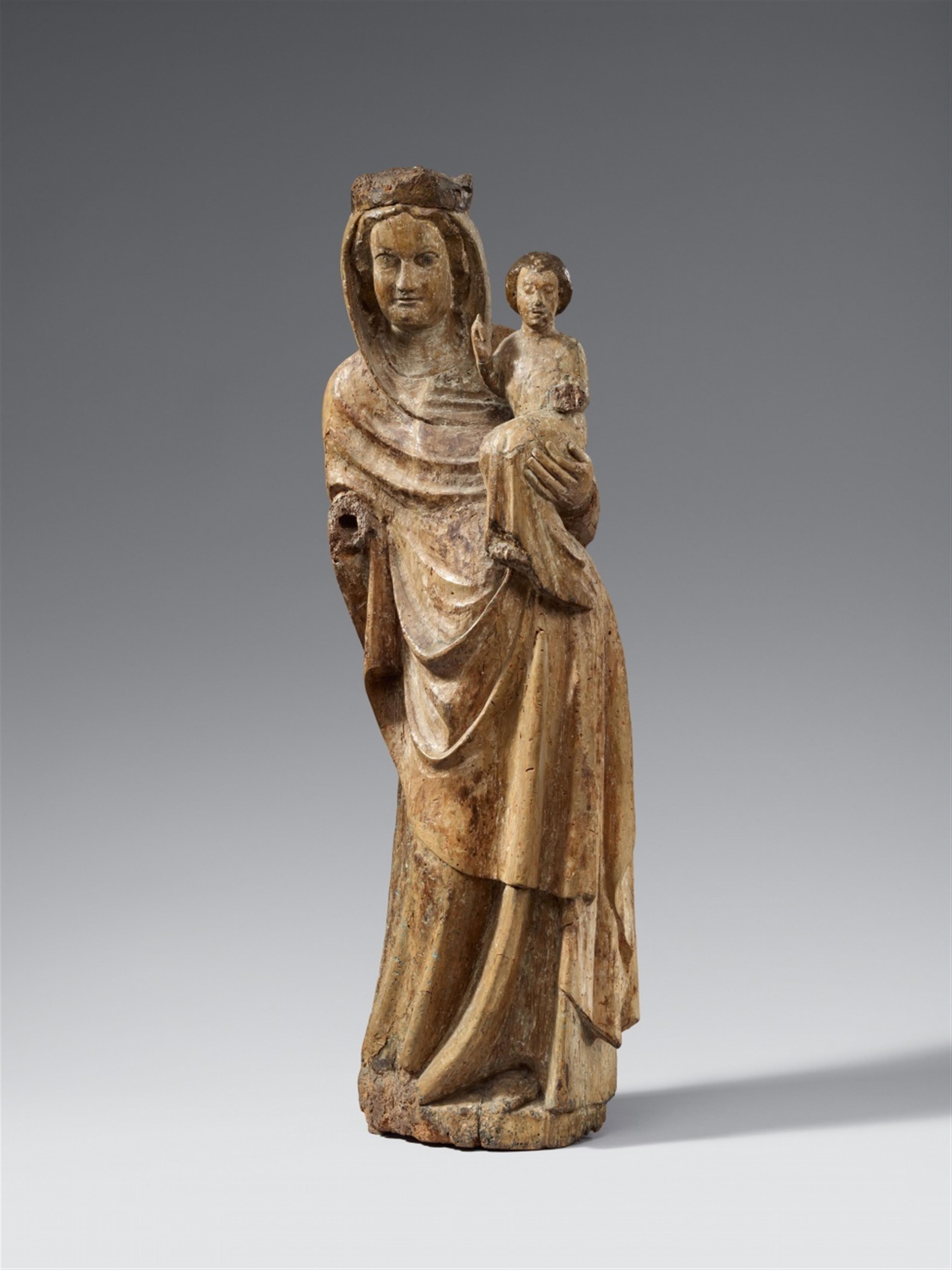 Austria circa 1320 - An Austrian carved wooden figure of the Virgin and Child, circa 1320 - image-1
